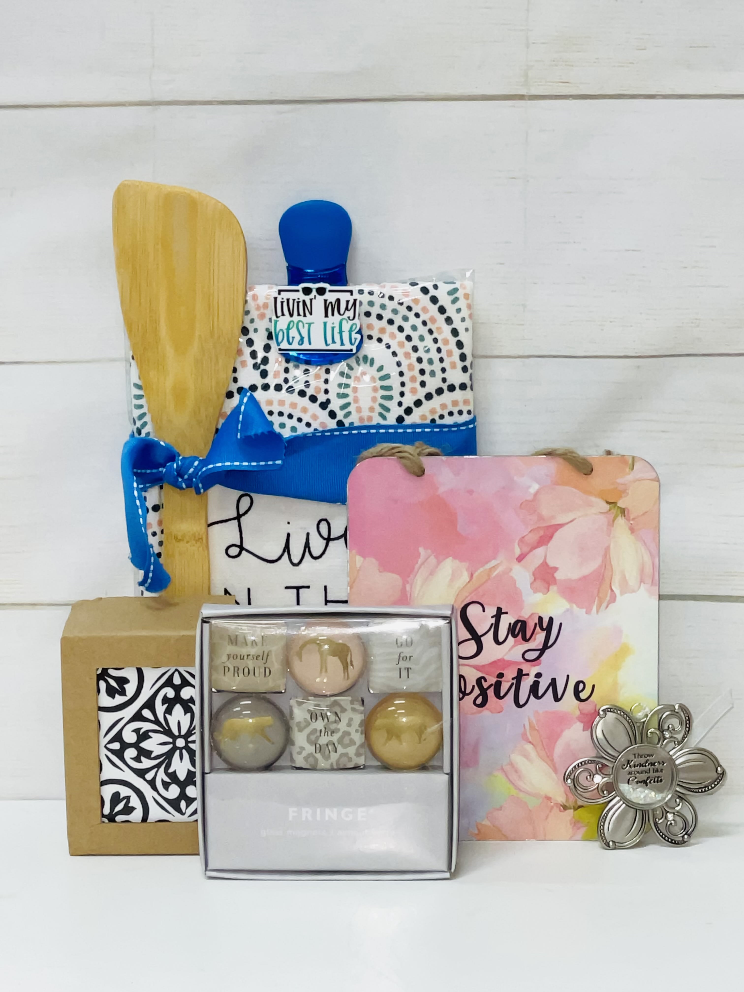 Gifts For Your Home Set, Small ($60 Retail Value) - Home Essentials Gift Set  Brighten up any home with this thoughtfully curated gift set. Perfect for adding a touch of charm and positivity, this set includes practical and decorative items that are sure to be appreciated.  Includes:  Dish Towel Set: A set of stylish and practical dish towels, perfect for adding a pop of color and functionality to the kitchen. Set of Coasters: Elegant and functional coasters to protect surfaces while adding a decorative touch to any room. Set of Magnets: Decorative magnets that can be used on the refrigerator or any magnetic surface, perfect for holding notes, photos, or reminders. Positive Message Wall Plaque: An inspiring wall plaque with a positive message to uplift and motivate. Charm: A beautiful charm that can be used as a decorative piece or a thoughtful gift for someone special.  Key Features:  Thoughtfully Curated: A selection of items chosen to bring charm, functionality, and positivity to any home.  High-Quality Items: Ensuring durability and long-lasting enjoyment.  Perfect Gift: Ideal for housewarmings, birthdays, or just because, this set is sure to be appreciated by anyone who loves to add a touch of style and positivity to their home.  Enhance any home with our Home Essentials Gift Set, a perfect combination of practical and decorative items that bring joy and functionality to everyday life.