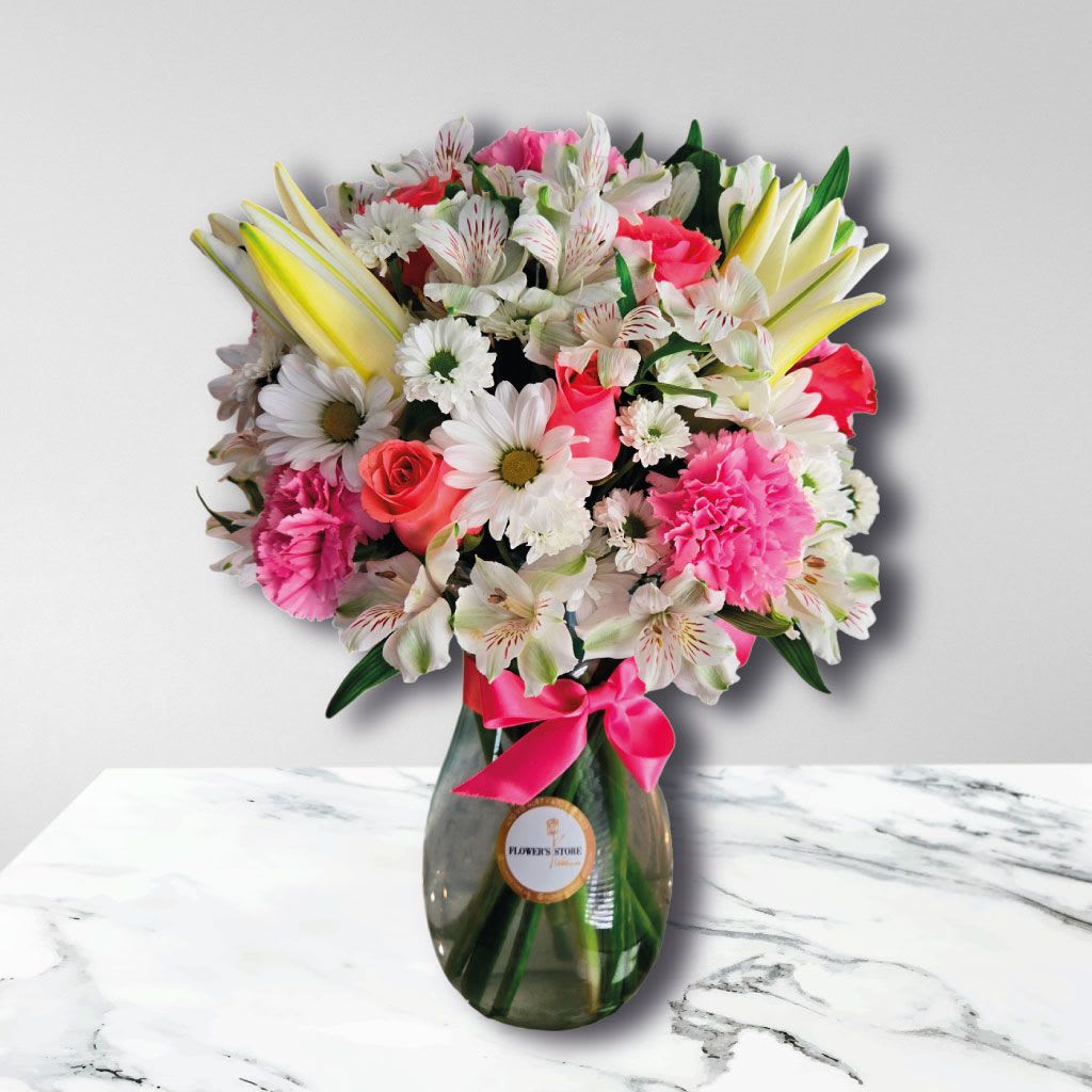 Flower Melody Flower Melody - • Carnations • Daisies • Alstroemerias • Roses • Lilies • Glass vase