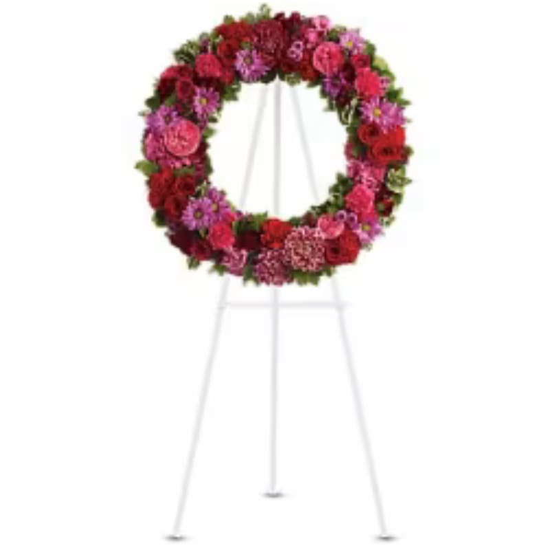 Infinite Love Infinite Love - This beautiful wreath stands as a testament to the circle of life that must be acknowledged even in our saddest moments. It will surely be appreciated by all in attendance.