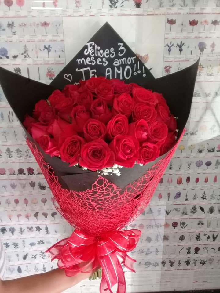 2 DOZ RED REOSES WRAPPED 2 DOZ RED REOSES WRAPPED - 2 DOZ RED ROSES WRAPPED WITH OPTIONAL MESSAGE ON BLACK PAPER