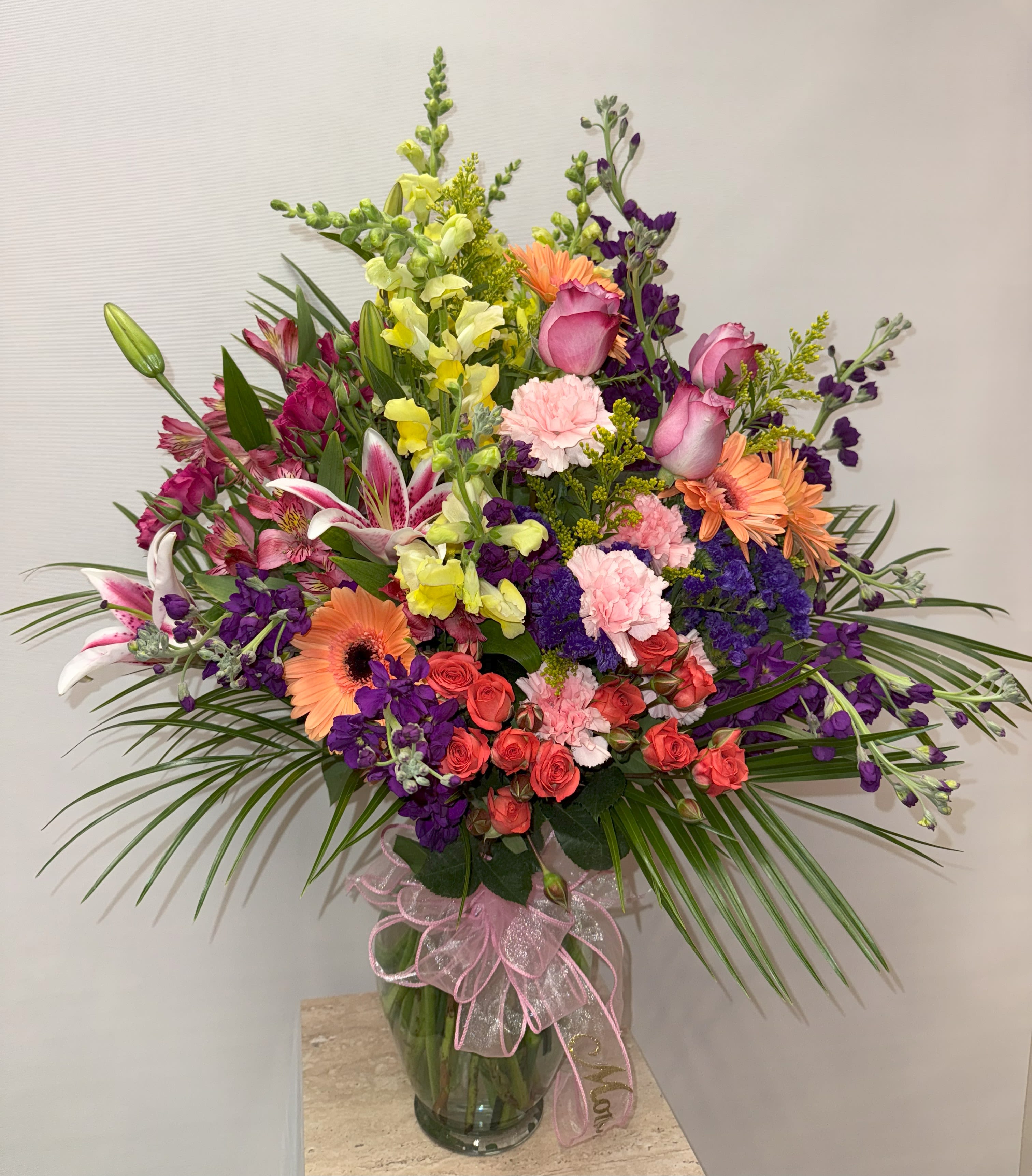 RainbowRoad RainbowRoad - Colorful vase arrangement with a variety of colorful flowers. Appropriate for any occasion