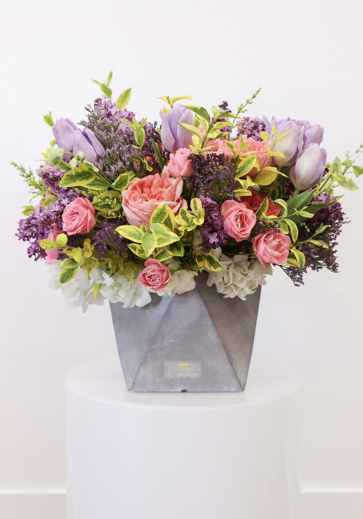 Koya - Arrangement comes with the following flowers; hydrangea, lilac, tulips, spray roses, with greenery. 