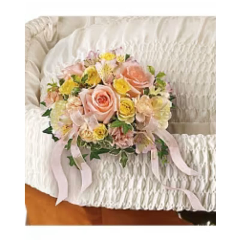 With Affection Nosegay With Affection Nosegay - Pay tribute to a truly special soul with this delicate arrangement of soft peach roses and yellow spray roses. Accented with ribbons and fresh green pitta negra it's an affectionate touch.