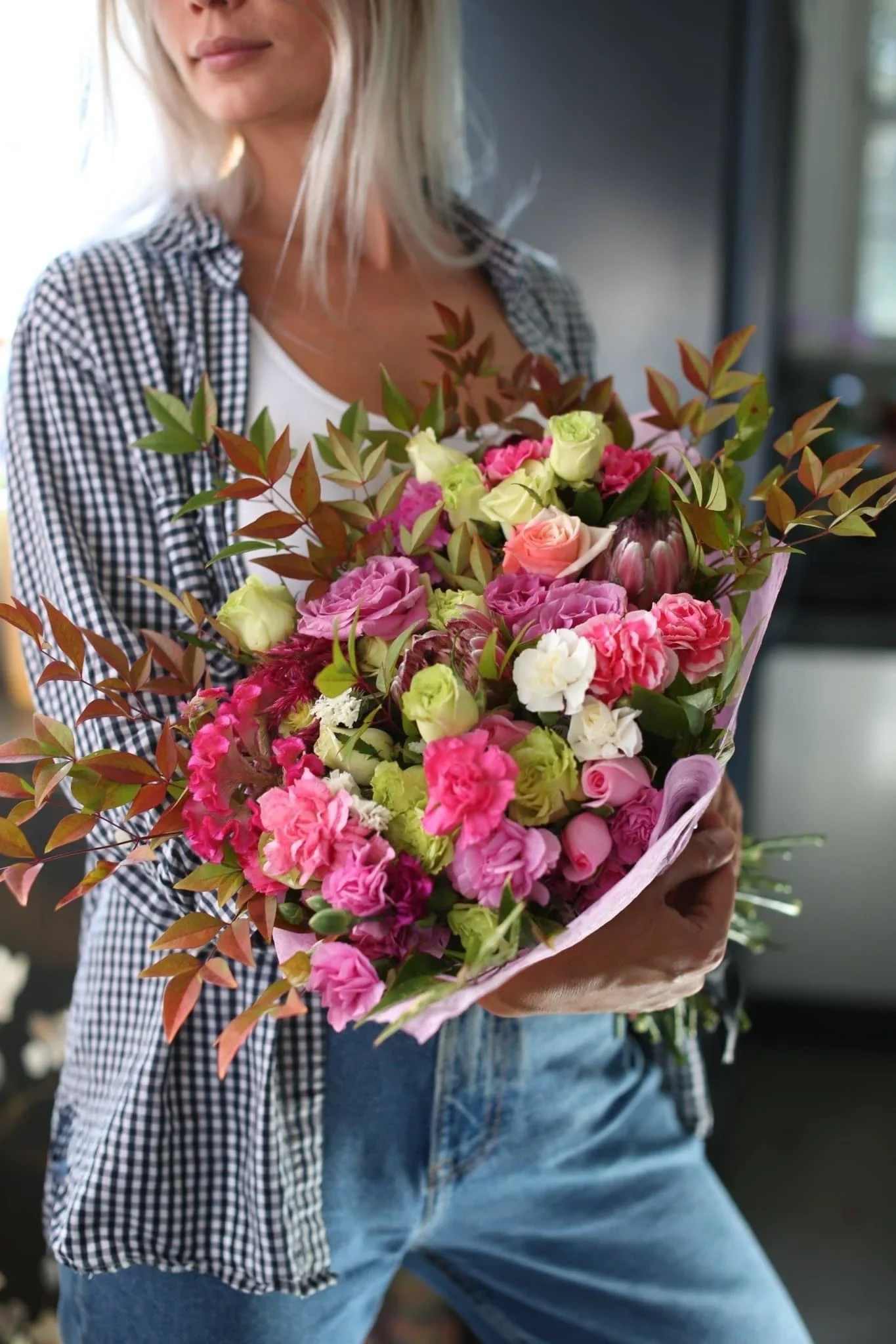Aminah - Aminah is a multi-color bouquet of mix of red, pink, yellow, green roses, and carnations. It will suit a birthday, sympathy, date, Thanksgiving Day, Valentine's Day, or any other occasion.