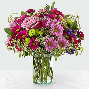 The FTD® Sweet Nothings Bouquet The FTD® Sweet Nothings Bouquet - Dazzle your customers with stunning violet and green hues set within a glass cylinder vase. A collection of roses, daisies and statice, our Sweet Nothings Bouquet sends sweet sentiment deep within each bloom. GOOD bouquet is approx. 14″H x 14″W. BETTER bouquet is approx. 15″H x 15″W. BEST bouquet is approx. 16″H x 17″W. (z)
