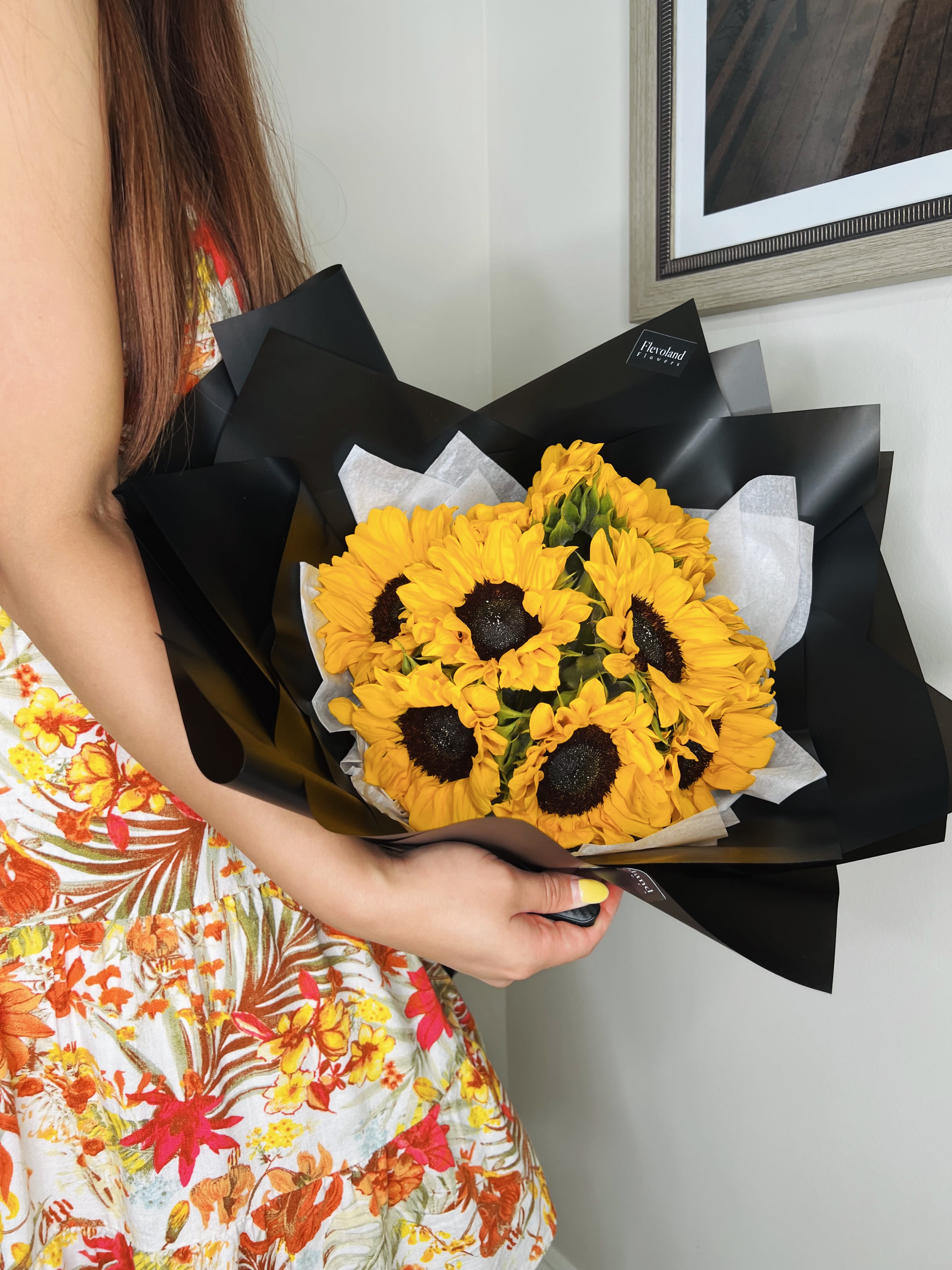 Sunflowers bouquet  - For sunflower lovers.  Vibrant sunflowers wrapped in black paper, creating a striking contrast that enhances their natural beauty. A perfect gift to brighten any day with style.
