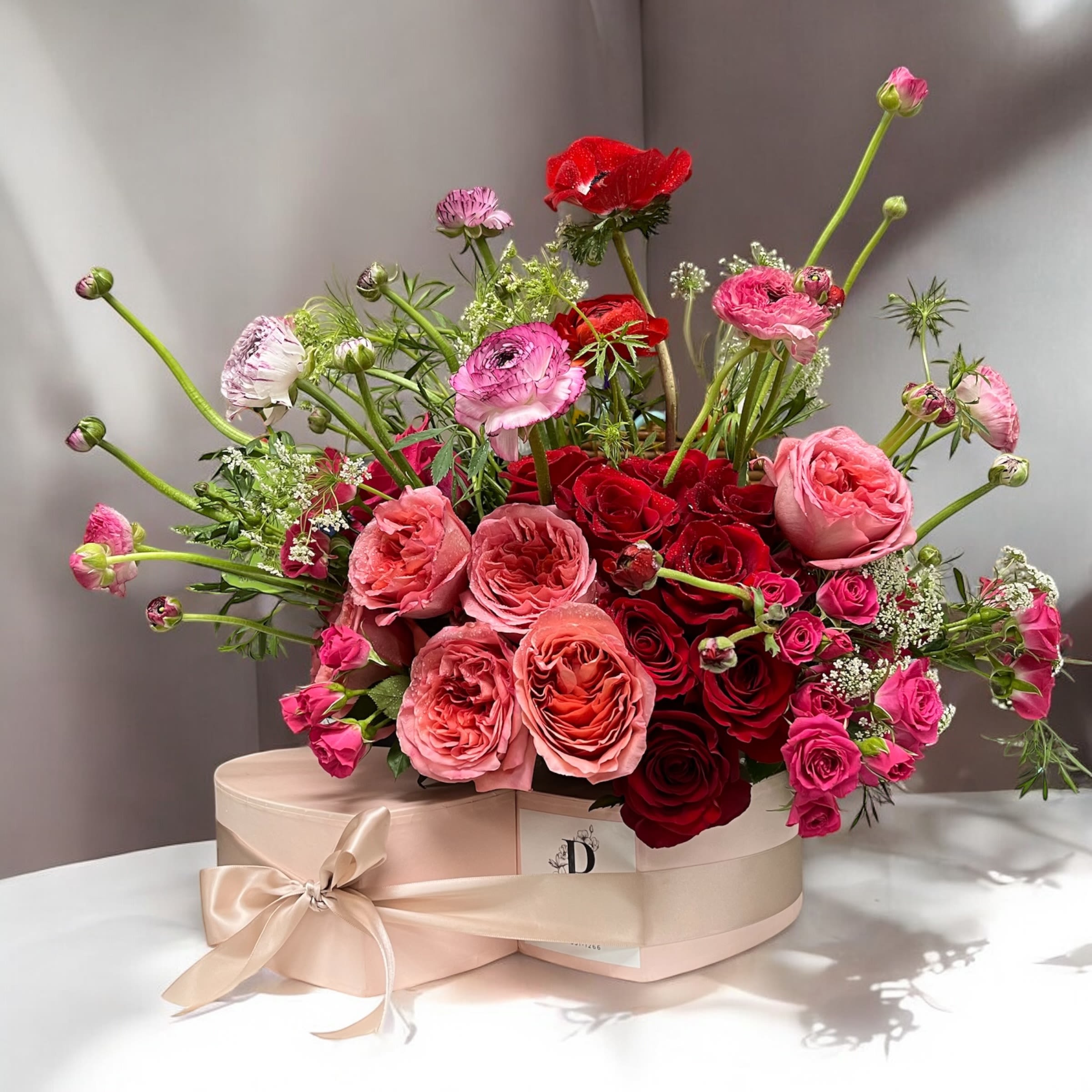 Bloomcuterie Box - Blooms and charcuterie combination in collaboration with Cheese To Table!  Presents as a normal box of flowers that slides apart to reveal a delicious charcuterie surprise!  Available in black, white or pink box **subject to availability** **PLACE ORDER AT LEAST 2 DAYS IN ADVANCE; SPECIFY WHICH COLOR BOX IN SPECIAL INSTRUCTIONS** 
