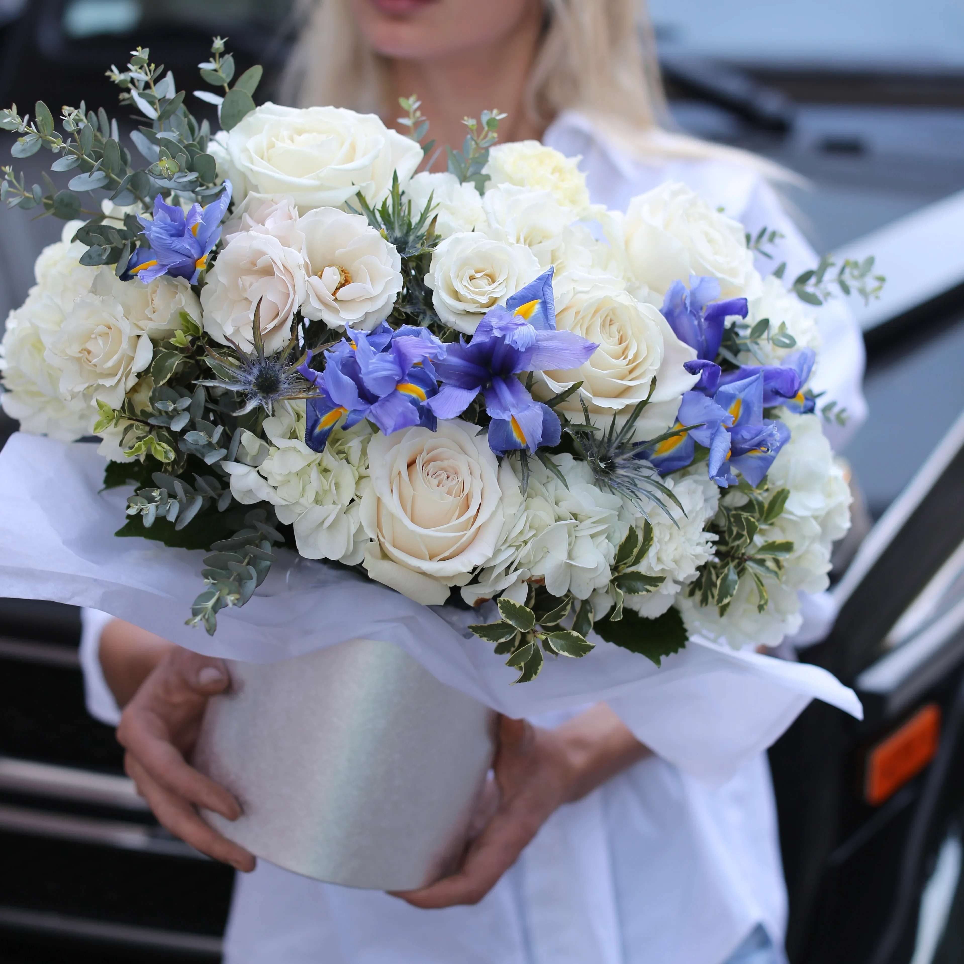 Marine Breeze - Marine breeze is a fresh and beautiful flower arrangement with irises, white roses and mix flowers. It comes in a box and it will be a perfect gift for anyone. 