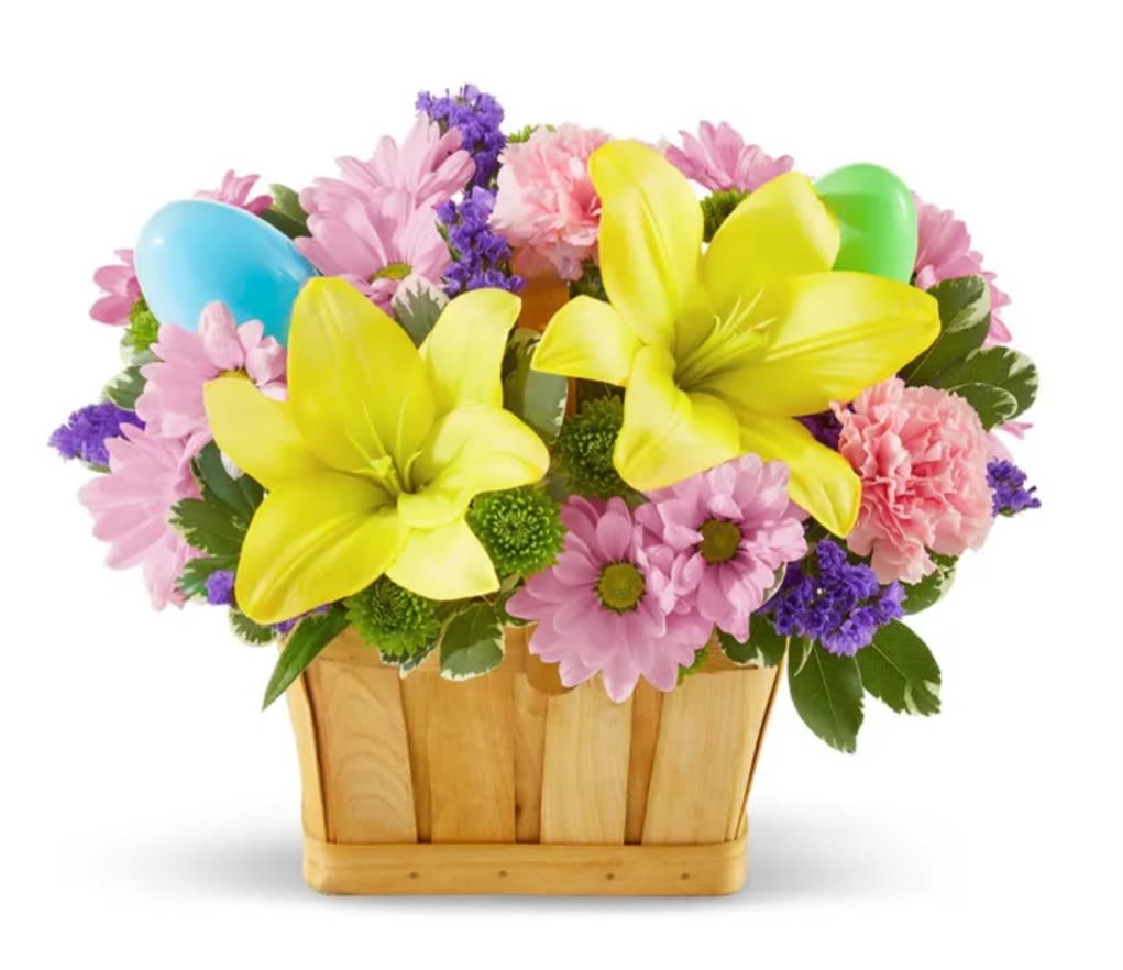 YUKI YUKI - A beautiful basket with a composition of daisies, roses, and lilies in the vibrant colors that characterize this season, with Easter eggs perfect for any event or to brighten your loved one's day.