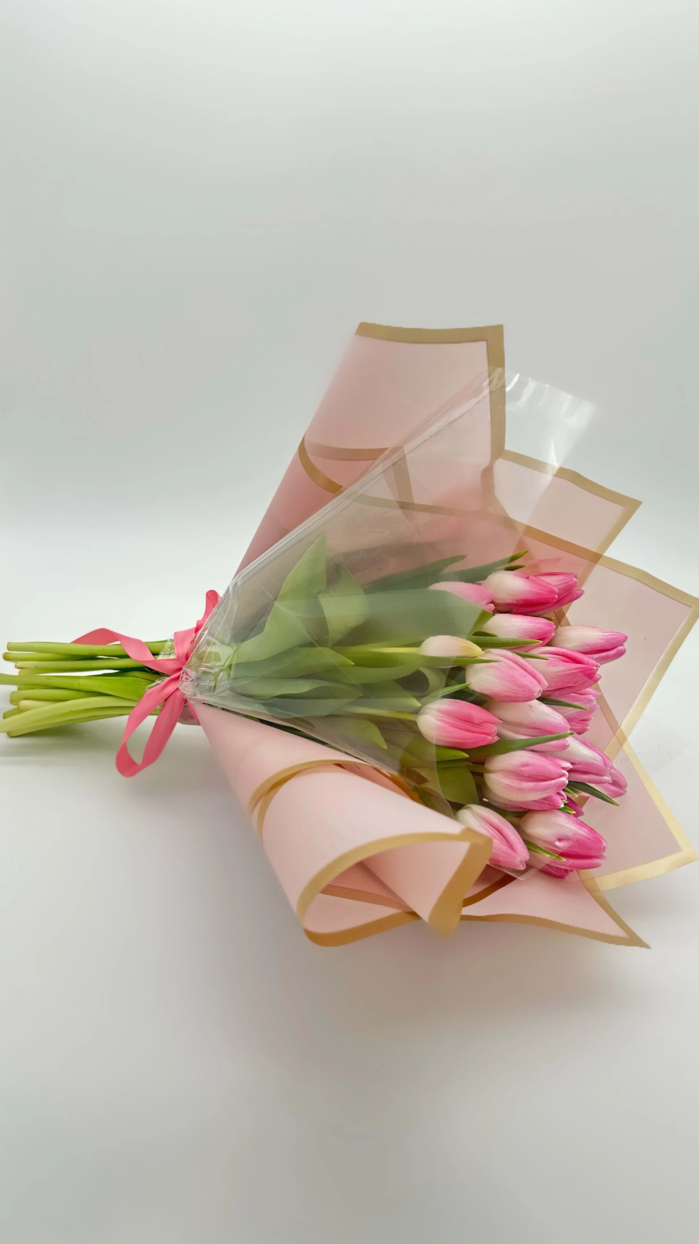 Blush Blush - 24 Blush Tulips hand wrapped in specialty floral paper