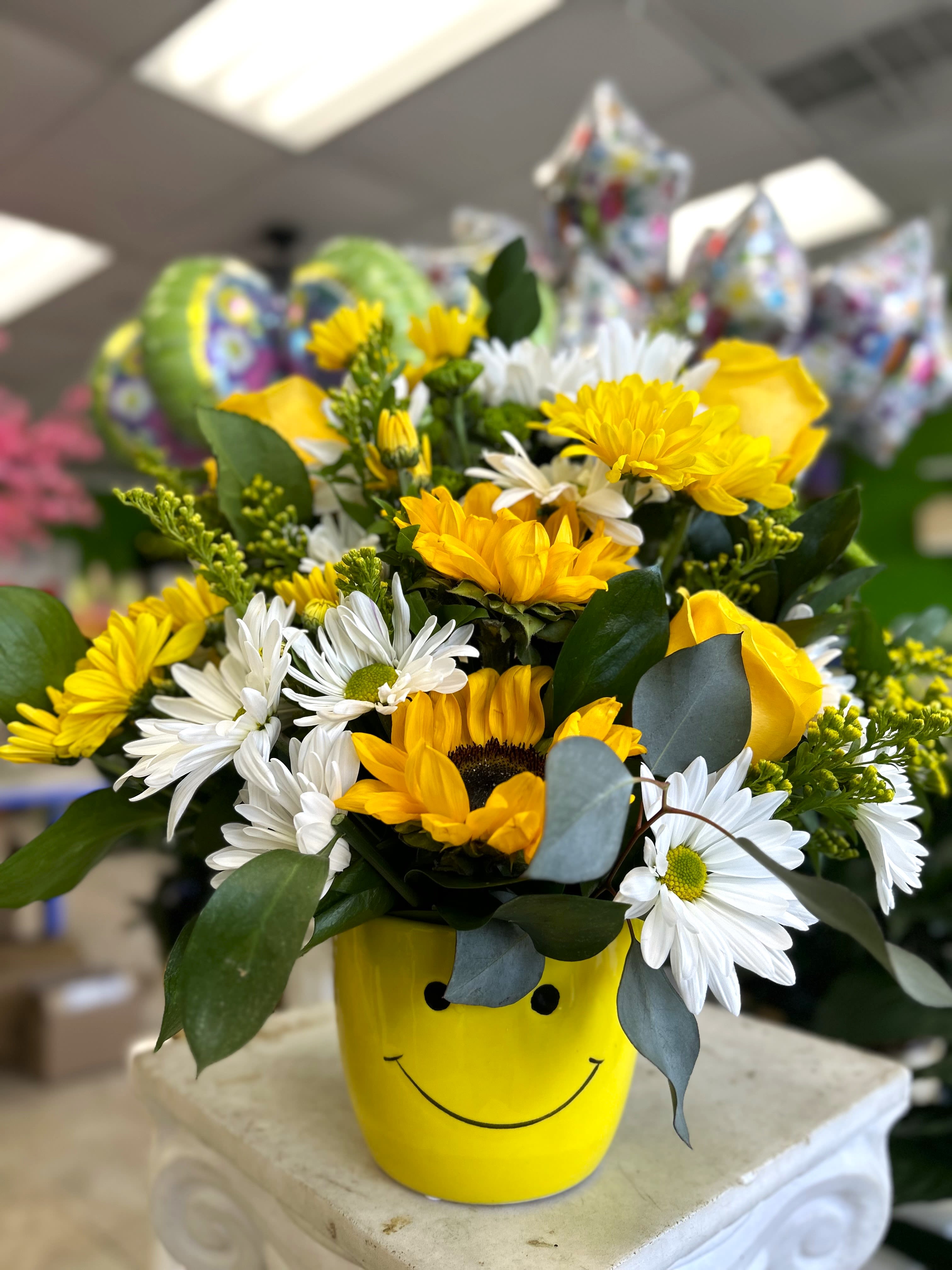 Dont worry be happy - Sending someone a smile is as easy and sending them this smiling flower bouquet