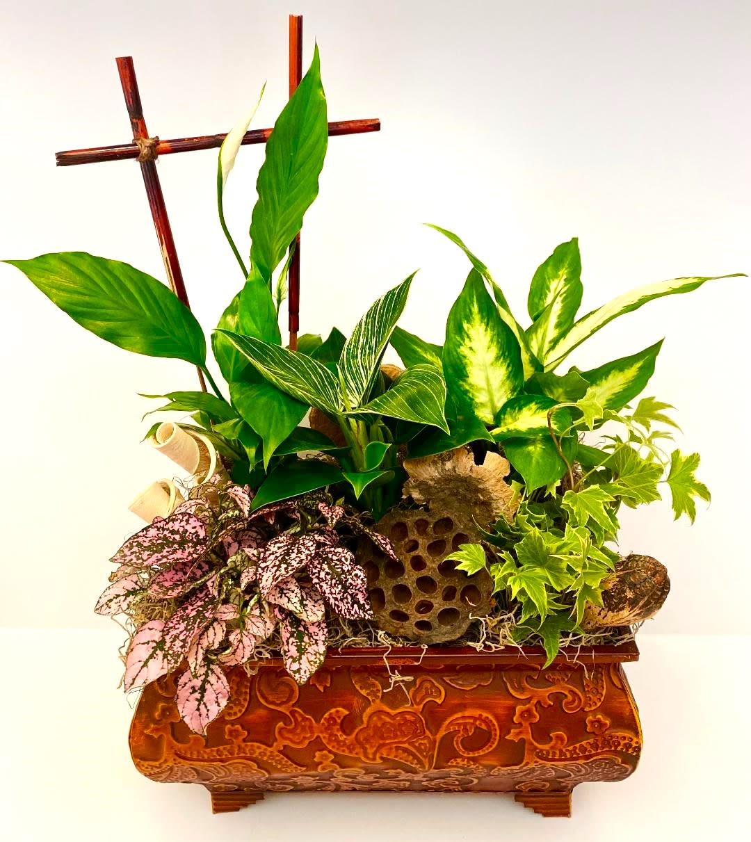 Large Dish Garden Large Dish Garden - This elegant Dish Garden includes five lush plants that will add fresh air to any room and is perfect for just about any occasion. All five items are set in a decorative pressed metal container and accented with natural accents such as wood curls, river cane, mushroom caps, and lotus pods. The large size dish garden measures approx. 18"W x 22"H. Container may vary.