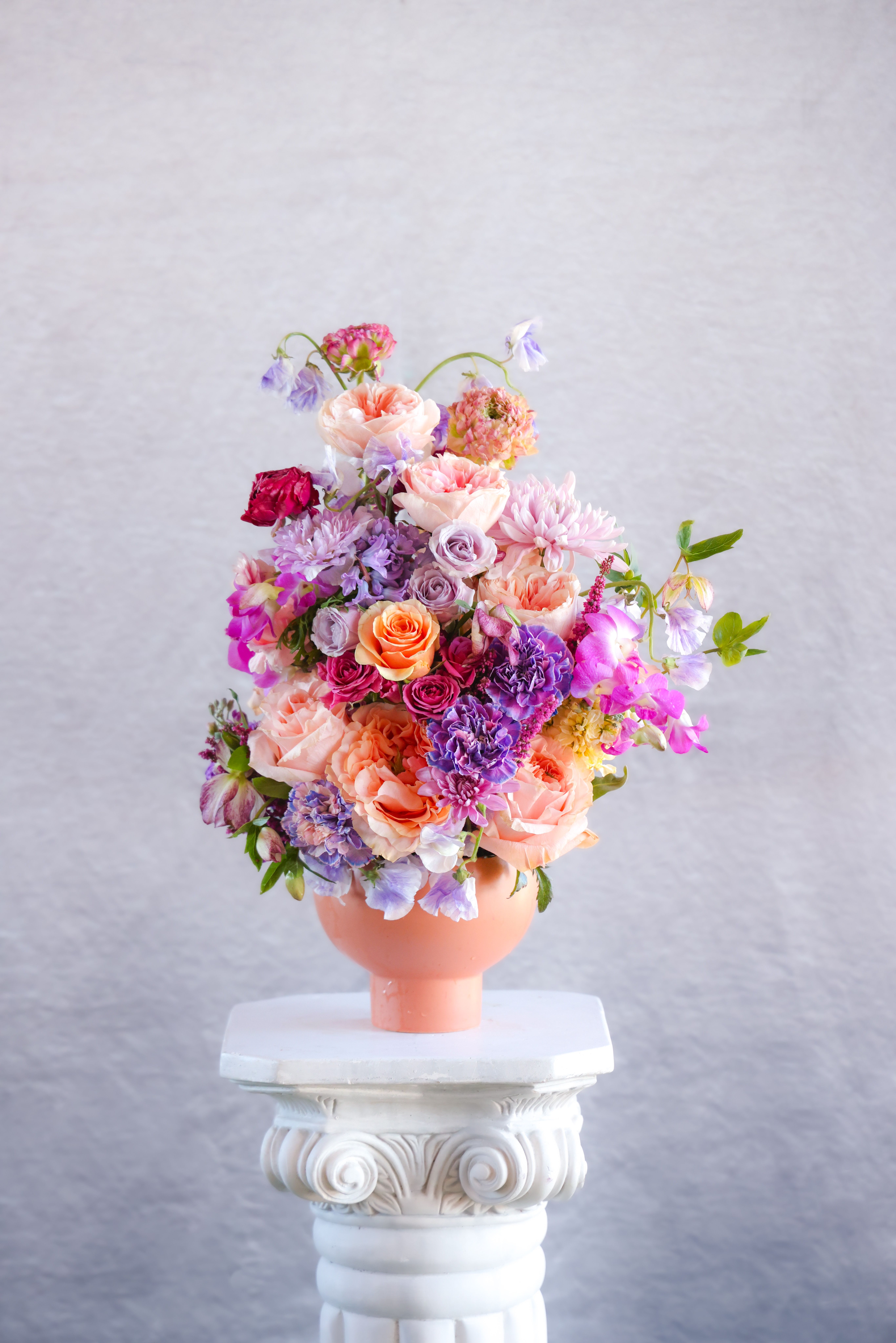The Warm Embrace Arrangement - Custom, one of a kind floral arrangements by floral artist Stacy Leafsong. Arrangement shown is a premium.   Photos provide examples, and each arrangement &amp; vase is unique.  Arrangements will be delivered before 7pm, for specific delivery time please include in special instructions. On holidays, our busiest times, deliveries will be made by 7:30pm.  