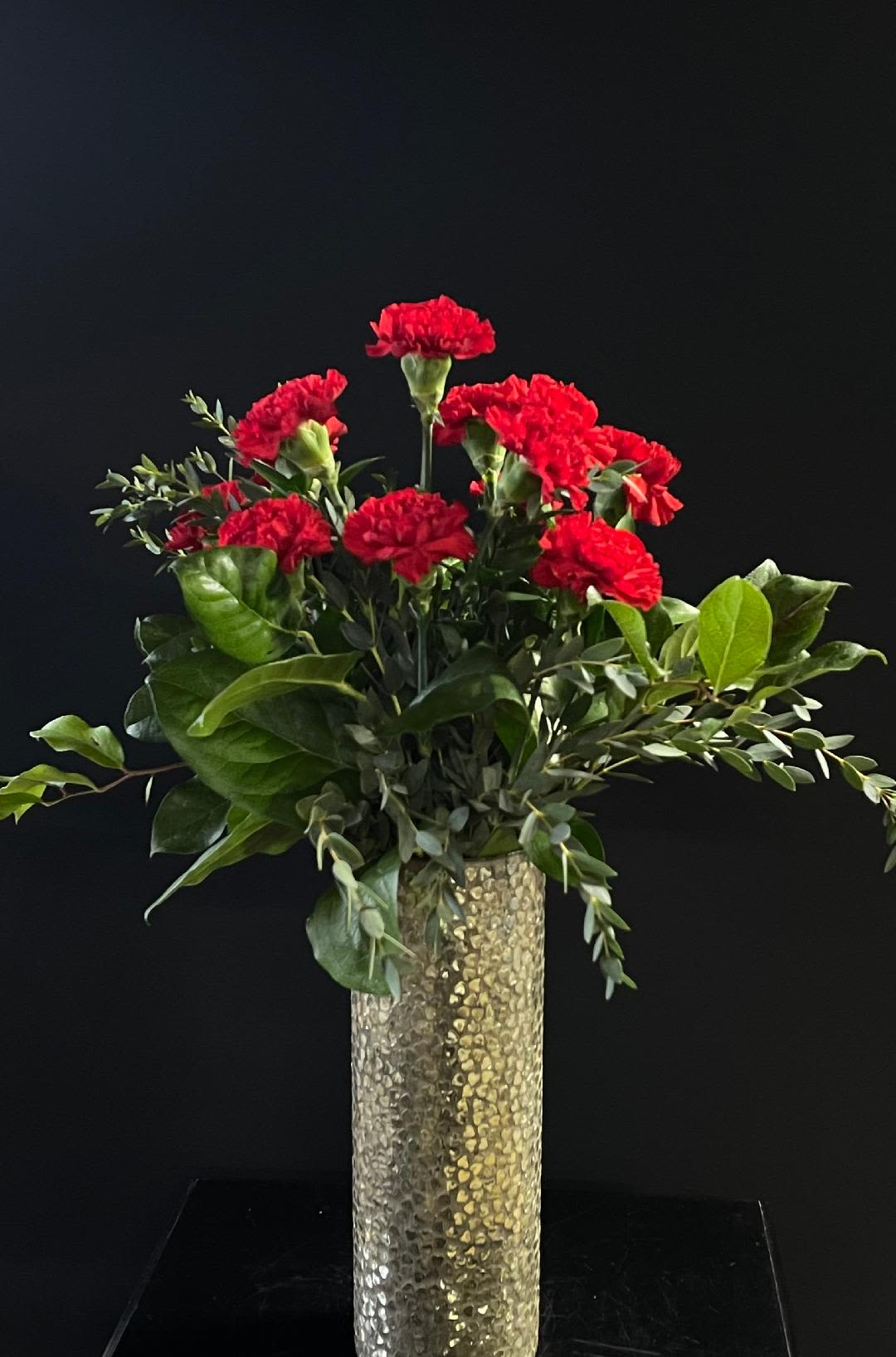 Heartbreaker - Beautiful and Elegant yet perfect for the occasion.  This tall vase has tiny hearts adorning it, making it a sweet keepsake.