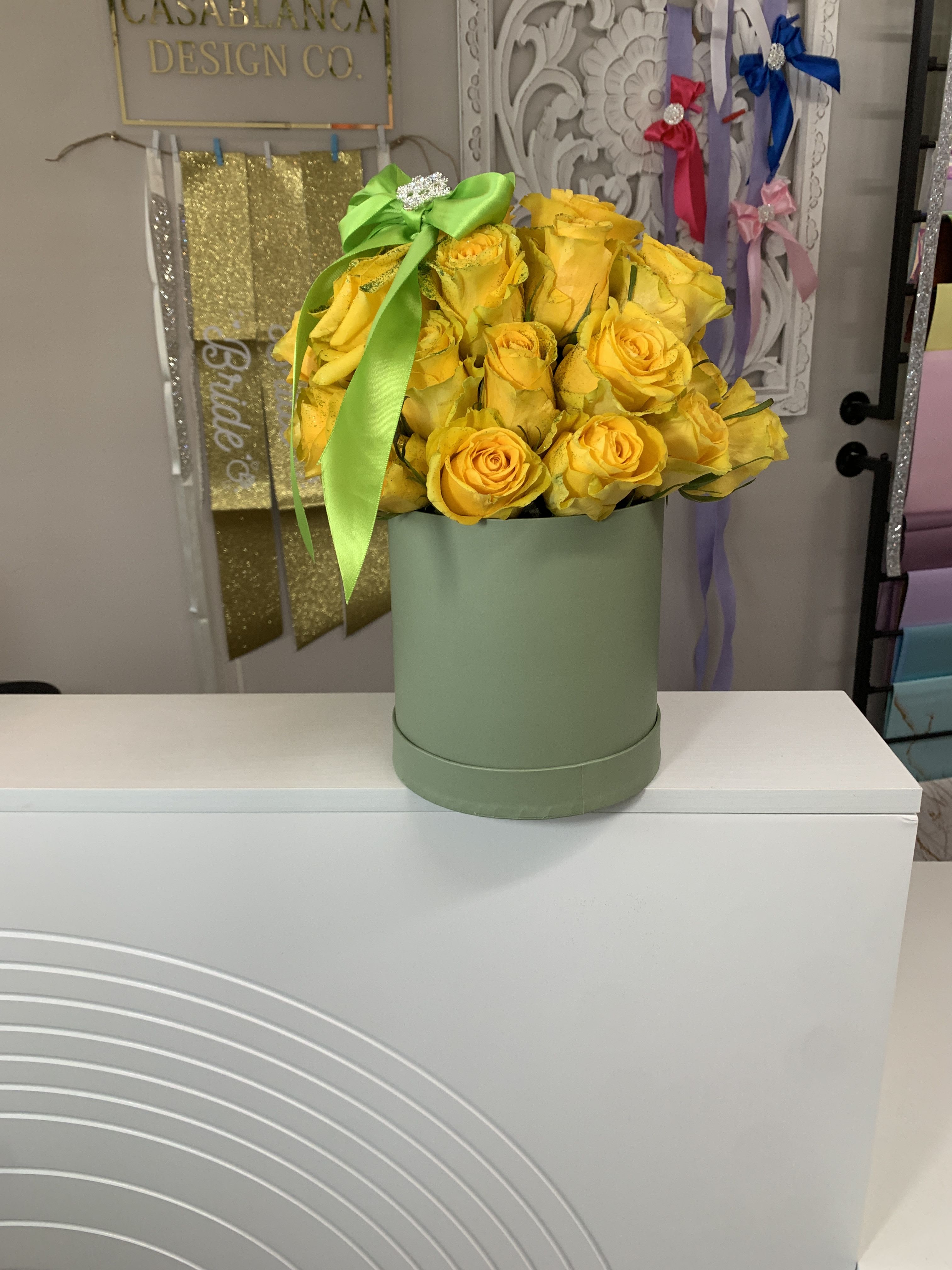 Tiana  - Yellow glitter roses in a lightly muted green box with a lime green bow 