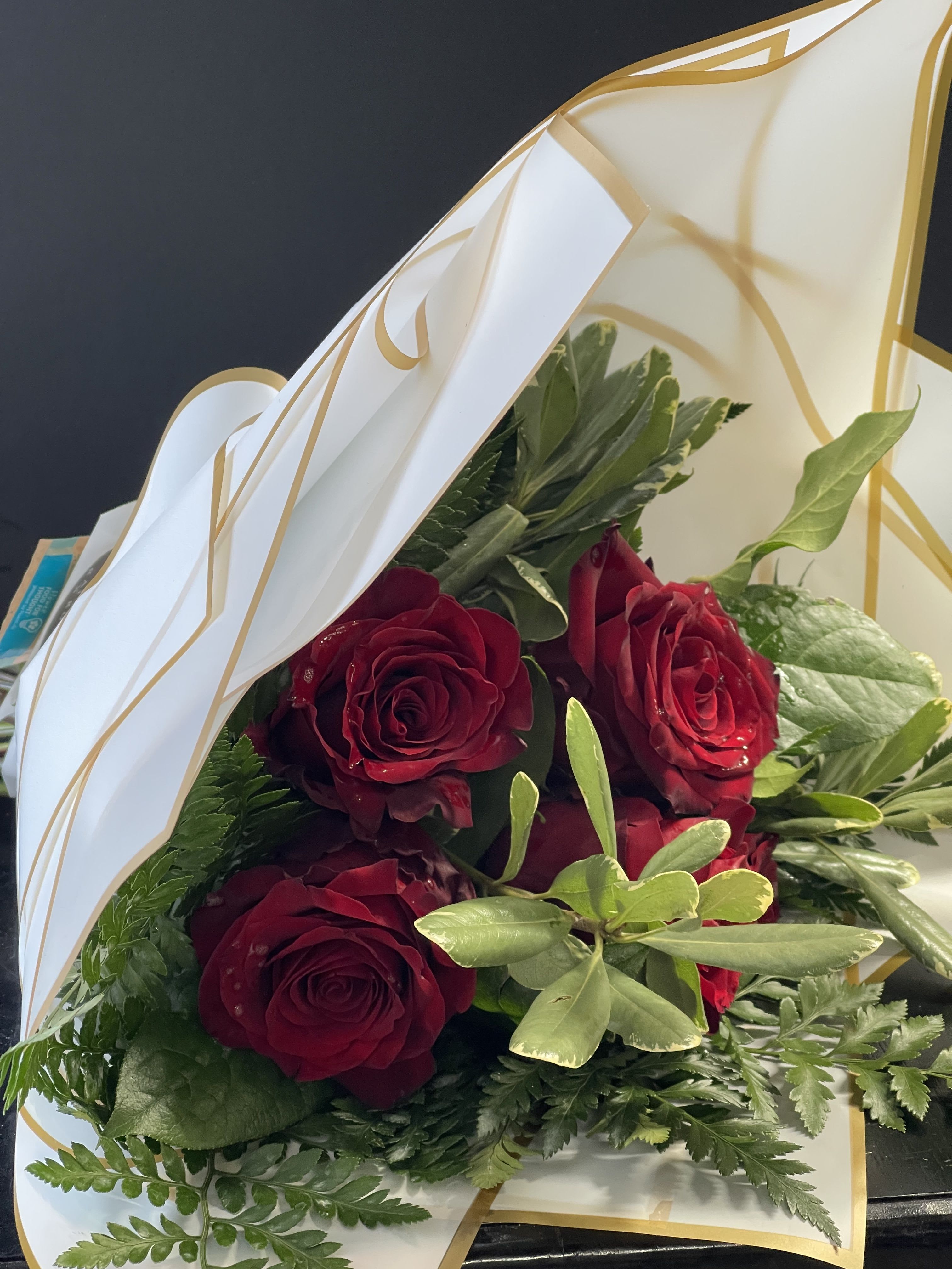 Half Dozen Rose Wrapped - Wrapped half dozen roses, you can choose your color.  If no color is indicated, we will do as pictured.