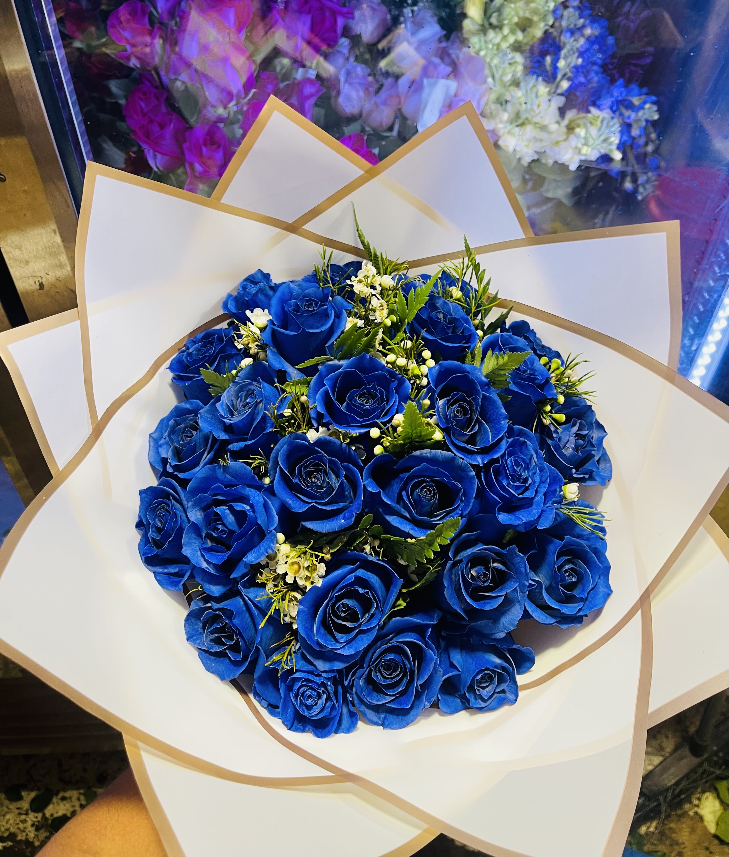 Blue roses - blue roses wrapped in white paper