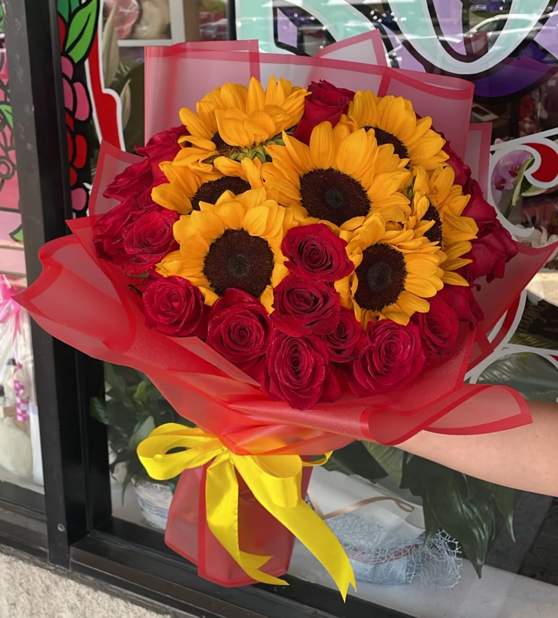 Sunflower x Rose Bouquet - Sunflowers with a mix of red roses in red paper. 20 Roses and 8 Sunflowers