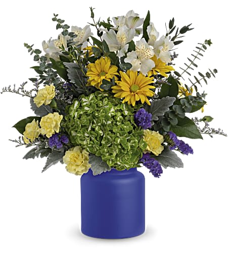  Sunrise At Sea Bouquet - Capture the magic of a sunrise at sea with this radiant white and yellow bouquet, arranged in a frosted glass vase the color of the deep ocean.