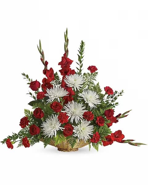 Enduring Grace Enduring Grace - Everyone mourning the loss of a loved one will be comforted by this lovely array of red roses, red gladioli and white mums. A beautiful choice for the memorial service. The radiant bouquet includes red roses, red gladioli, red carnations and white spider chrysanthemums, accented with assorted greenery. Delivered in a 14" fireside basket.
