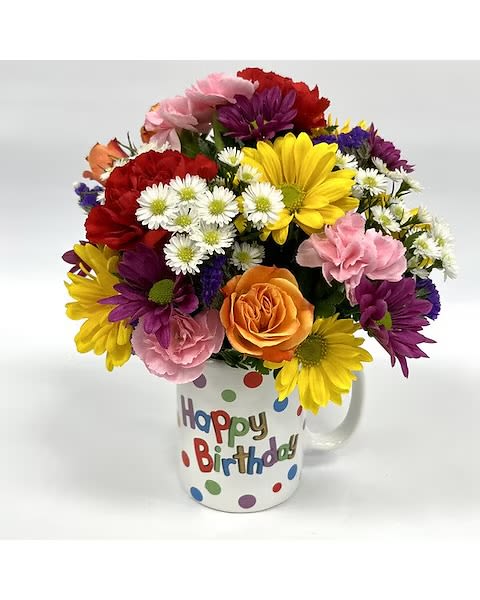 B-day Cup-O-Flowers - Not only is it a beautiful arrangement, once the flowers are no more they have a cute little cup to remember the time u sent them well wishes. 