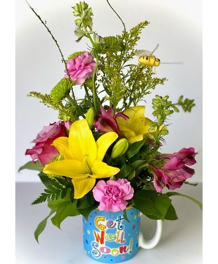 Get Well Cup-O-Flowers - Not only is it a beautiful arrangement, once the flowers are no more they have a cute little cup to remember the time u sent them well wishes. 