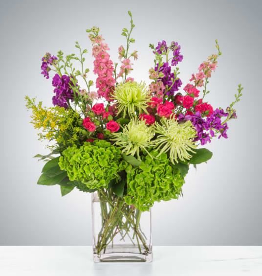 Sparklers by BloomNation™ - Featuring larkspur, spider mums, spray roses, and hydrangea this arrangement brings a brightly colored spark to anybody's life. Send it for birthdays, congratulations, and more.  Approximate Dimensions: 15&quot;D x 18&quot;H
