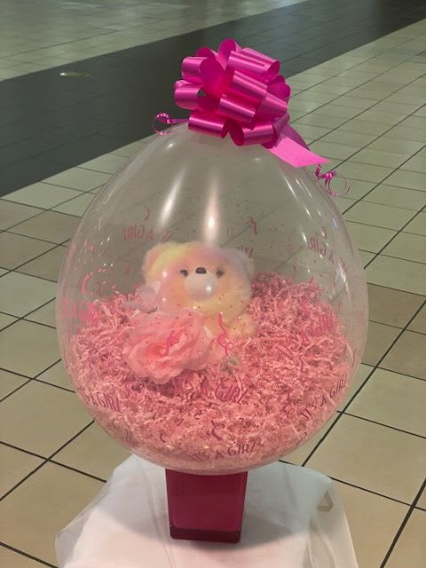 Stuffing Balloon - 1 stuff animal,1 Bloon, 1Bow tie, 1 Balloon tray,1 Balloon Bag, 1 single tube with 1 single rose of choice.  Standard:  1 Item of each Listed  Deluxe:  2 Stuff animals with Item Listed  Premium:  3 Stuff animals with Item Listed 