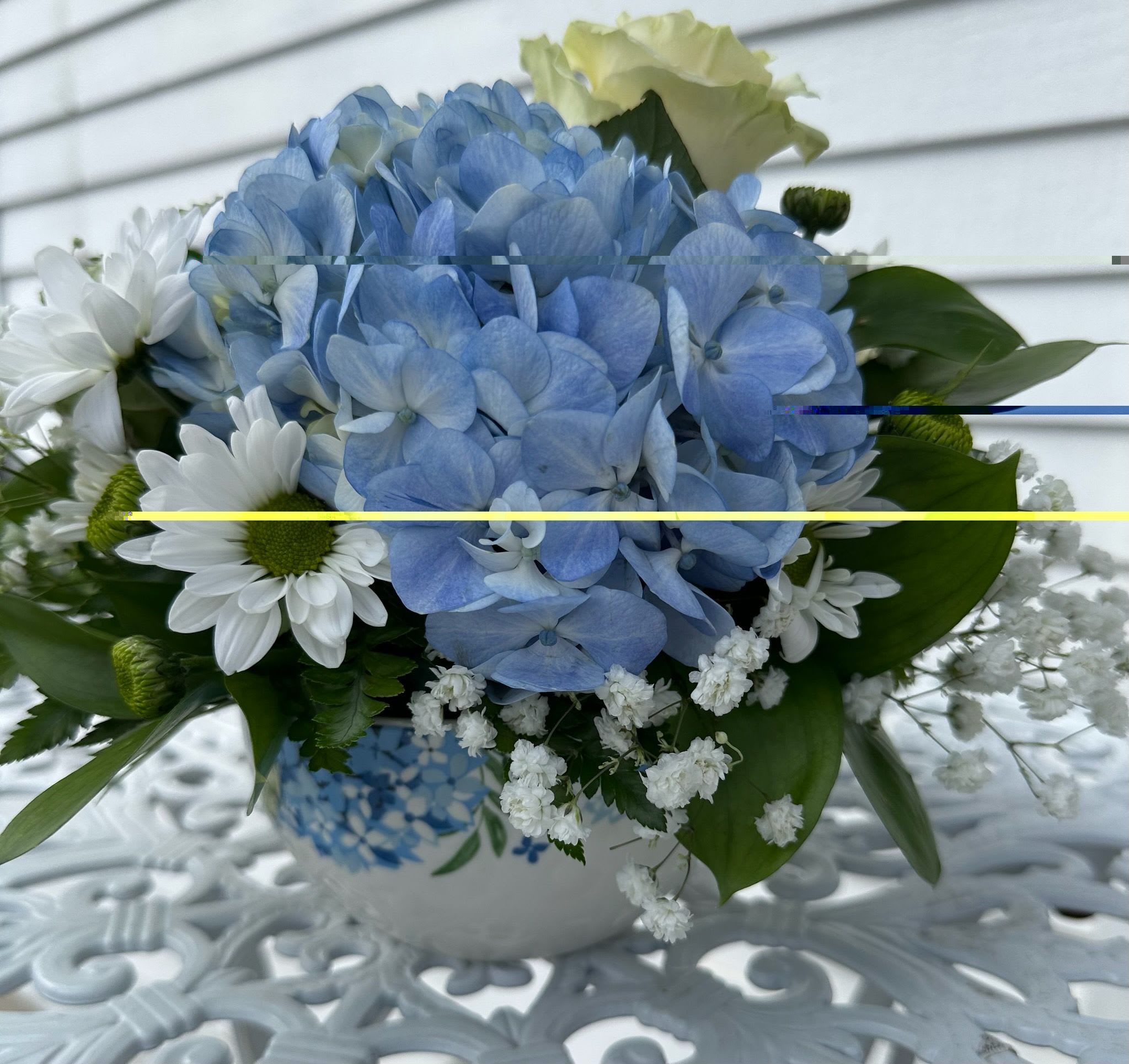 Token of appreciation Bouquet Token of appreciation Bouquet - Blue hydrangea, white roses, white daisys in a white ceramic