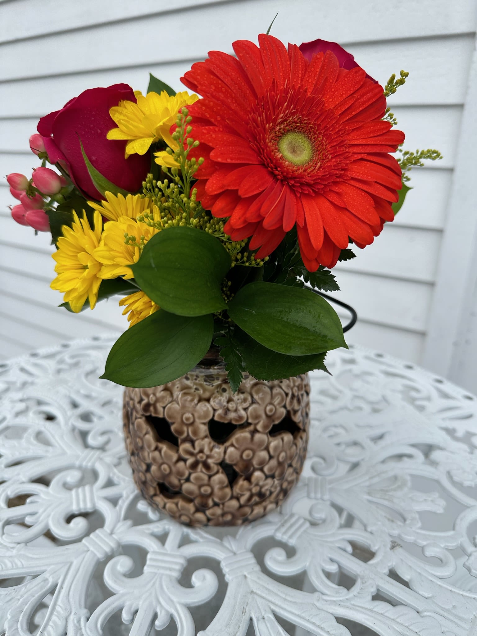 Thanks a Bunch Bouquet - Ceramic lantern with red roses, yellow daisys, orange gerbera, hypericum berries and solidago