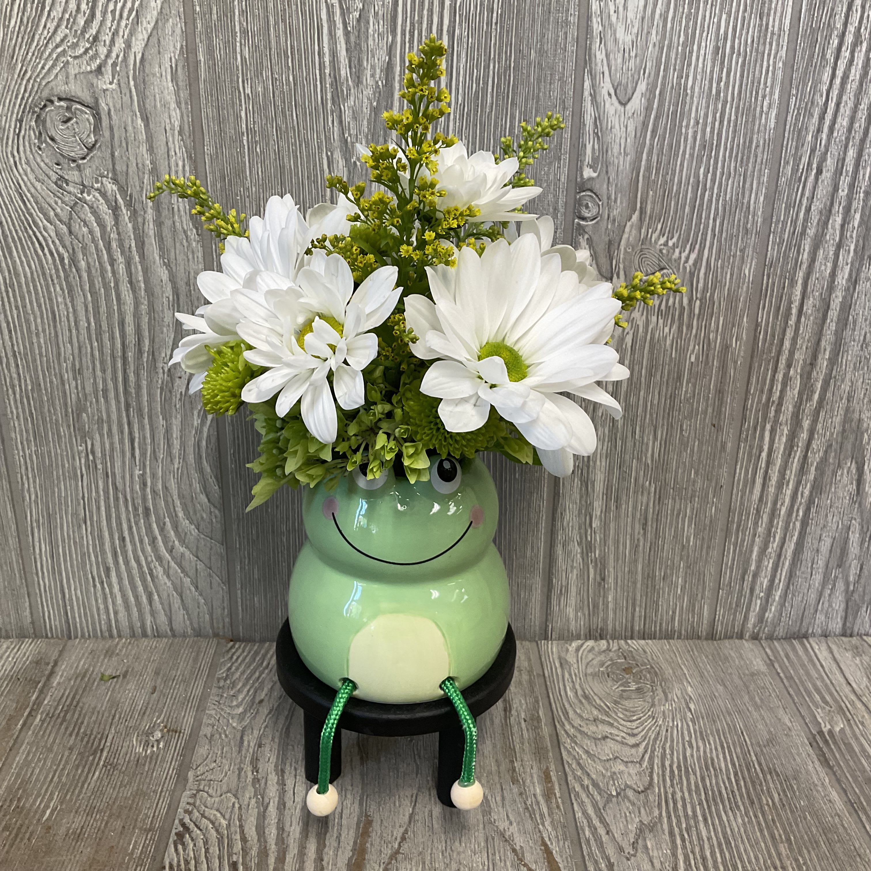 Ribbit - Ribbit! Perfect petite floral arrangement in a ceramic shelf-sitter container. Flowers and colors may vary. 