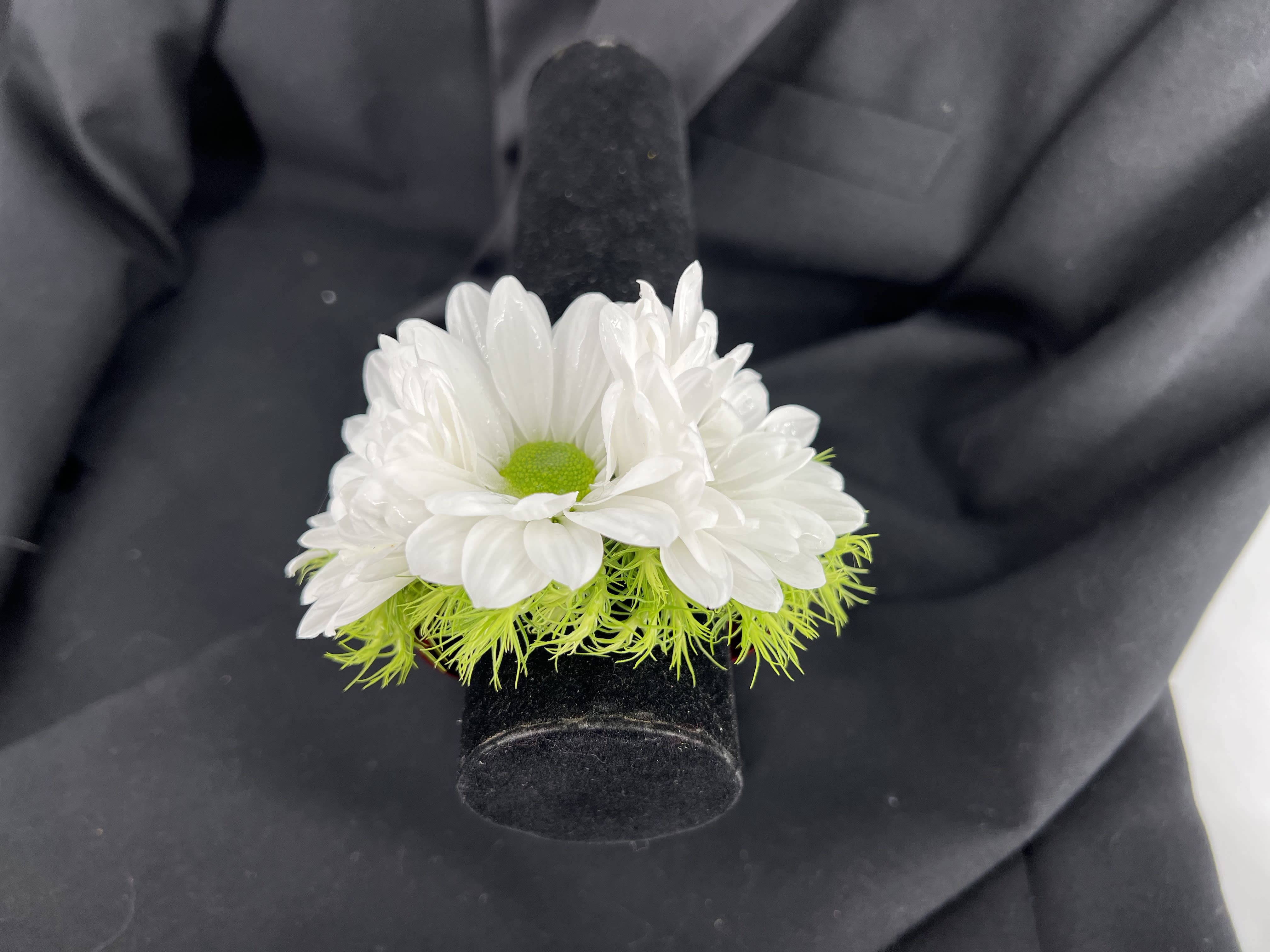  Corsage and Boutonniere  Special!  - A homecoming/Prom wristlet with a slap-on bracelet customized in your colors is a stylish accessory that will complement your formal outfit perfectly. The slap-on bracelet offers convenience and a fun element to your look. It's adorned with extra crystals and bling, adding a touch of glamour and sparkle to your ensemble.  To complete the set, a matching boutonniere is included, ensuring that both you and your date have coordinated accessories that make a statement at the homecoming event. This wristlet and boutonniere combination is a great way to show off your school spirit and celebrate the special occasion in style