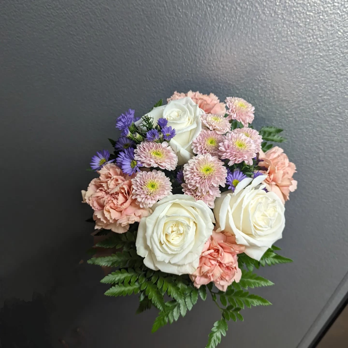 Mixed Hand Tie Bouquet Mixed Hand Tie Bouquet - Modern touch for your Prom and Homecoming. Order as is or call us for a custom design.