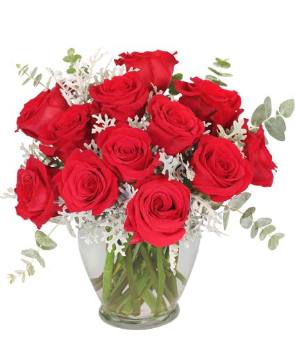 GUILTY PLEASURE DOZEN ROSES GUILTY PLEASURE DOZEN ROSES - Indulge your loved one with something truly special on this day filled with love! The radiant red roses mix with the decadent baby blue eucalyptus to create a truly drop-dead gorgeous bouquet. Elegant and divine, you won't feel guilty about this pleasure!
