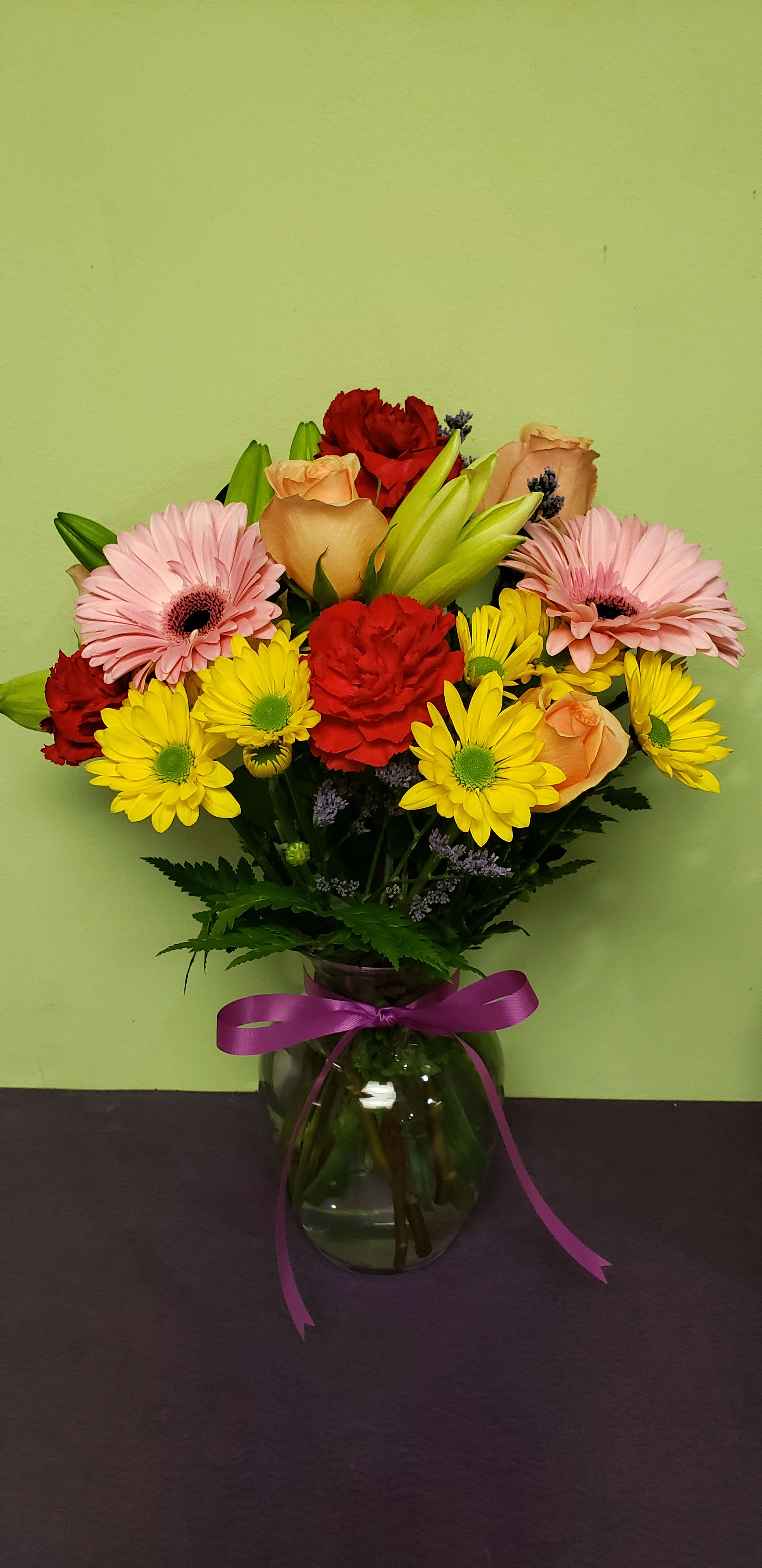 Spectacular Summer - What a better way to enjoy the summer than sending spectacular arrangements? If you agree, than send this SPECTACULAR arrangement!!! The arrangement includes Lilies, Roses, Gerbera Daisies, and Limonium to fill it up! Summer is here! 