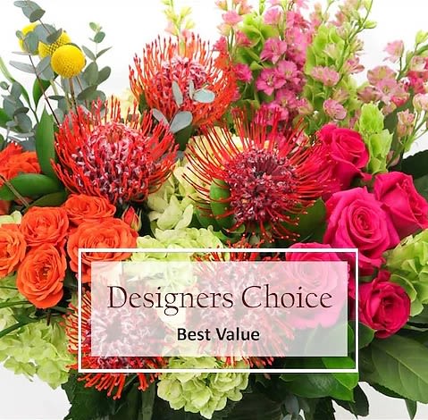 Designer's Choice - Let us create something unique and different just for you! We will utilize the freshest and prettiest flowers for your bouquet. No two are alike!!  Please specify any color, flower, or design requests in the &quot;Special Instructions&quot; portion during checkout!