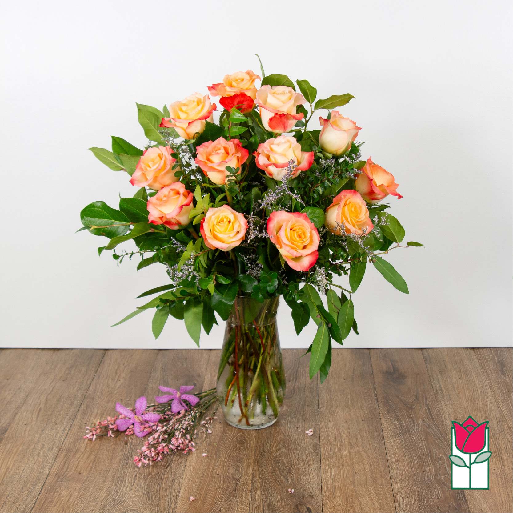 Beretania's Medium Stem Rose Arr - Peach Cabaret - Indulge in the timeless elegance of our Medium Stem Rose Arrangement, meticulously designed to captivate and inspire. Each exquisite arrangement is presented in a graceful glass vase, showcasing the natural beauty of our carefully selected roses. We take pride in sourcing the highest quality roses from around the world, ensuring that every bloom is a testament to luxury and sophistication.  Choose from a variety of captivating colors to personalize your arrangement, whether you prefer the classic allure of red, the soft romance of pink, or the purity of white. Our diverse range allows you to tailor this floral masterpiece to your unique style and preferences.  Convenience meets luxury with Beretania Florist. Enjoy the flexibility of ordering for pick-up or experience the ease of our convenient delivery service in the Honolulu area. Whether adorning your space or sending heartfelt sentiments to a loved one, our Medium Stem Rose Arrangement promises to elevate any occasion with its beauty and grace. Trust us to deliver not just flowers, but an exquisite floral experience that brightens your day.