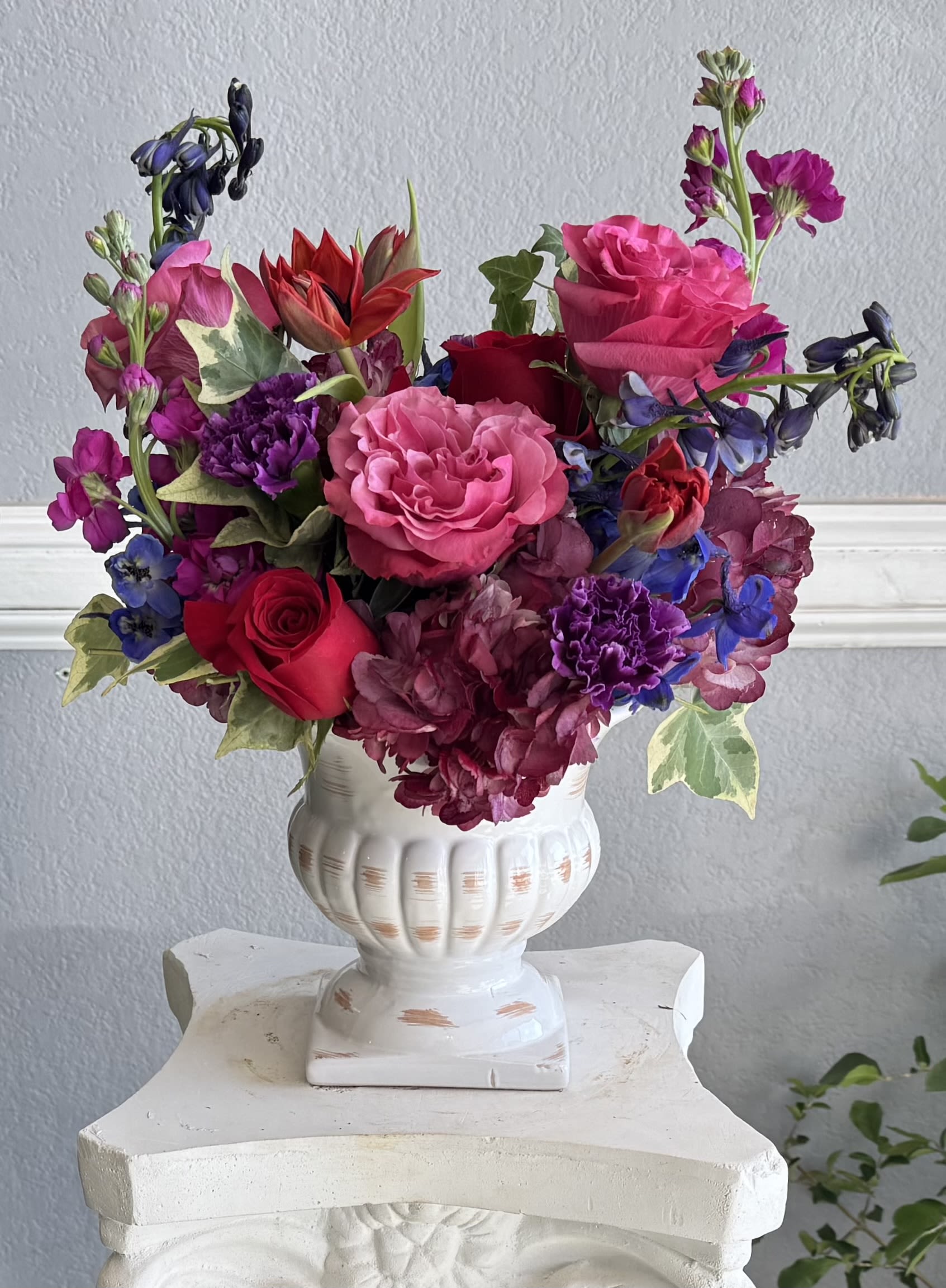 Victorian Gem Victorian Gem - Amethyst,garnet,sapphire a jewel toned victorian dream. Romantically designed in a ceramic container. Transport your loved one to a different time period with just a glance at this floral piece