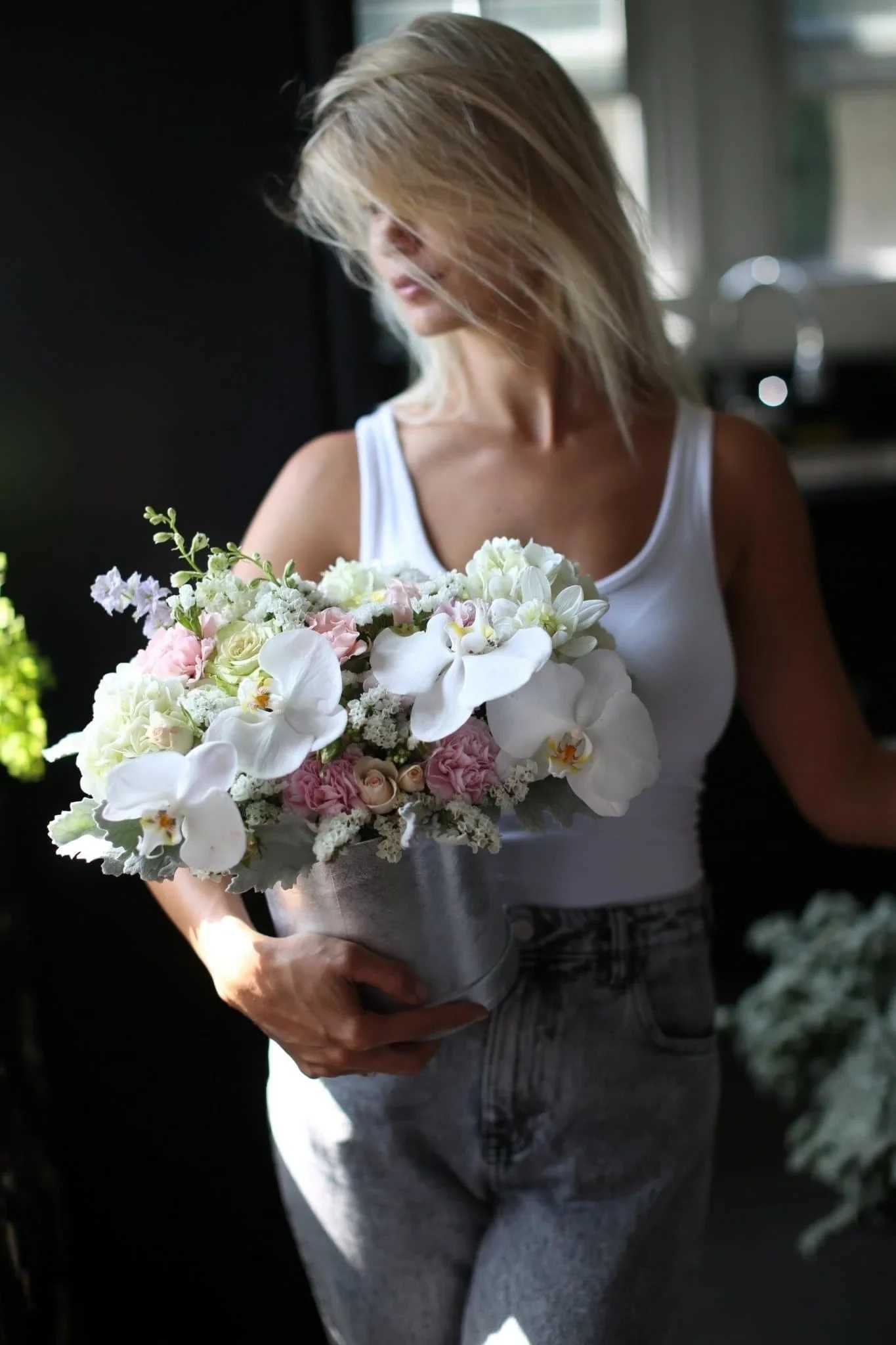 Christa - Christa is an arrangement that consists of orchids, roses, mums, hydrangea, carnations with some greenery in a box. Main colour theme is white and pink. It's great for any occasions.