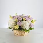 Offering Comfort by BloomNation™ Offering Comfort by BloomNation™ - A pastel flowering basket brings peace to any space. Send this beautiful basket to friends, coworkers or family during tough times to brighten any space and show how much you care.