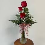 Thinking of You Thinking of You - Show someone you’re thinking of them with a charming presentation – this mix of pretty blossoms in a blend of warm-weather colors, tucked into a bowl lined with leaves and river rocks. A truly considerate gift.