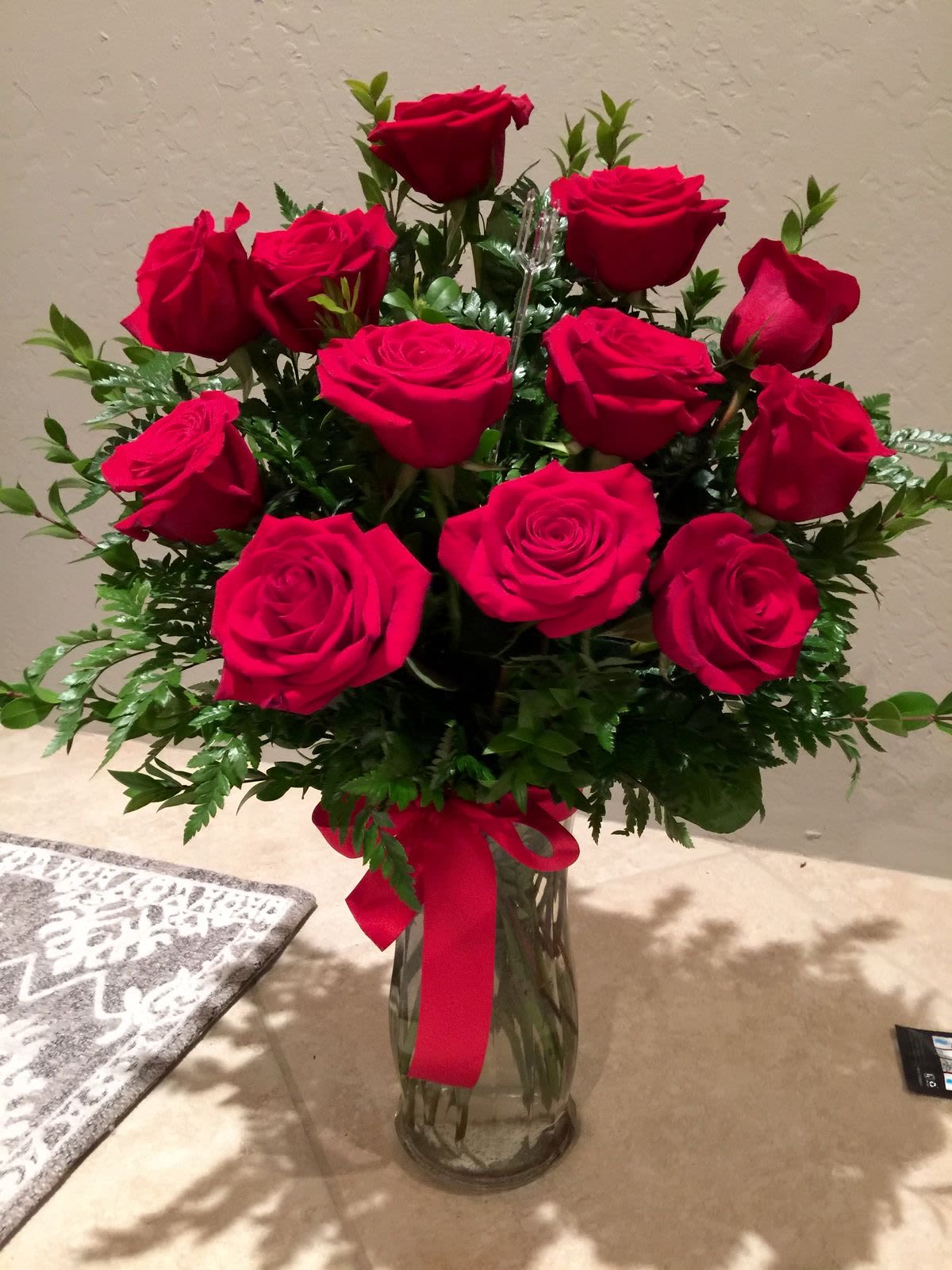 Sweet 12 red roses  - 12 red roses in a glass base And red riboon 