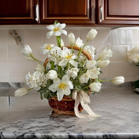Elegant White Flower Basket  - This stunning white tulip basket embodies grace, purity, and sophistication, making it the perfect floral arrangement for any occasion. Featuring fresh white tulips and Hyacinths, artistically arranged in a charming woven basket with a delicate  ribbon, this bouquet is a beautiful symbol of elegance and tranquility.   Fresh white tulips and delicate seasonal flowers  Perfect for birthdays, anniversaries, sympathy gifts, and housewarmings  A refined floral centerpiece for home décor, office spaces, and special events  A meaningful gift to express love, appreciation, or condolences