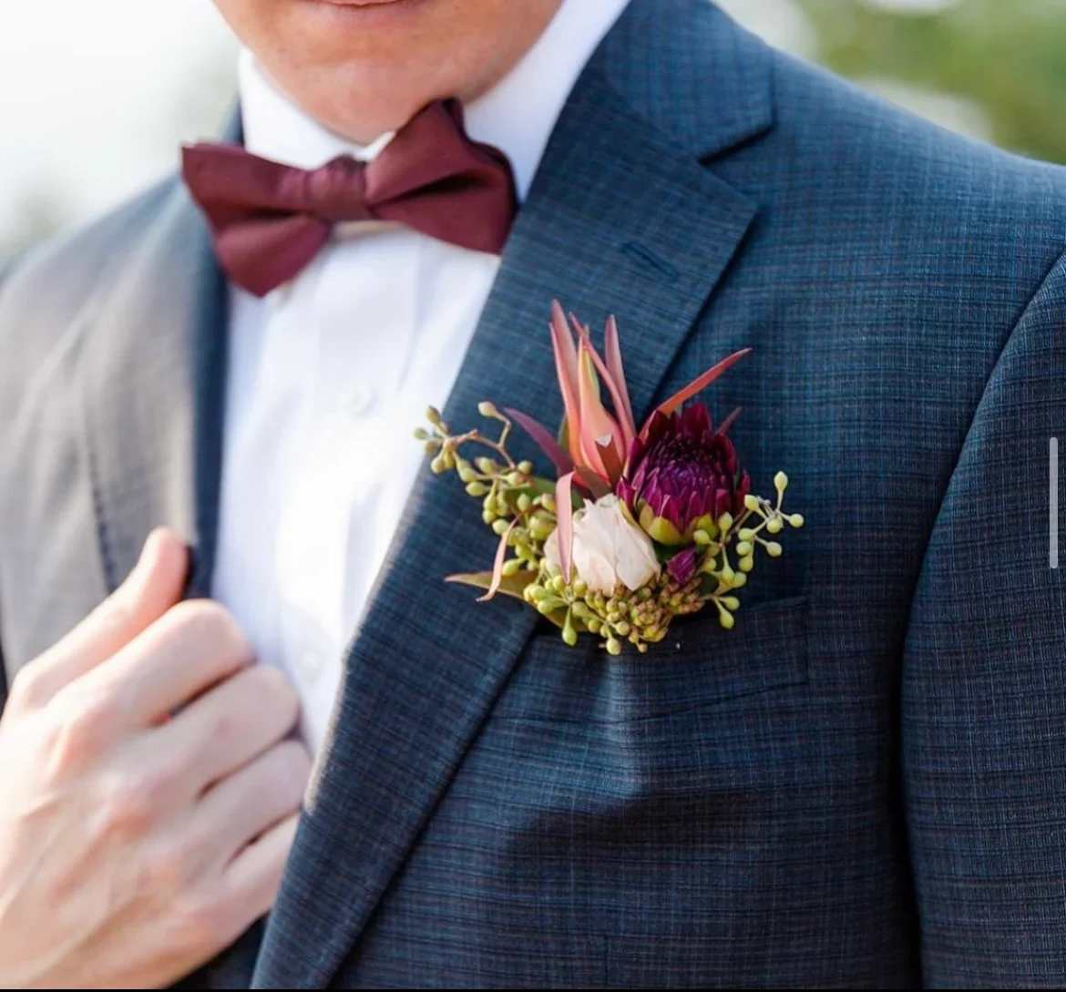 Boutonniere - We can do any color or any flowers you would like. Please call or text us to discuss your preferences and options.