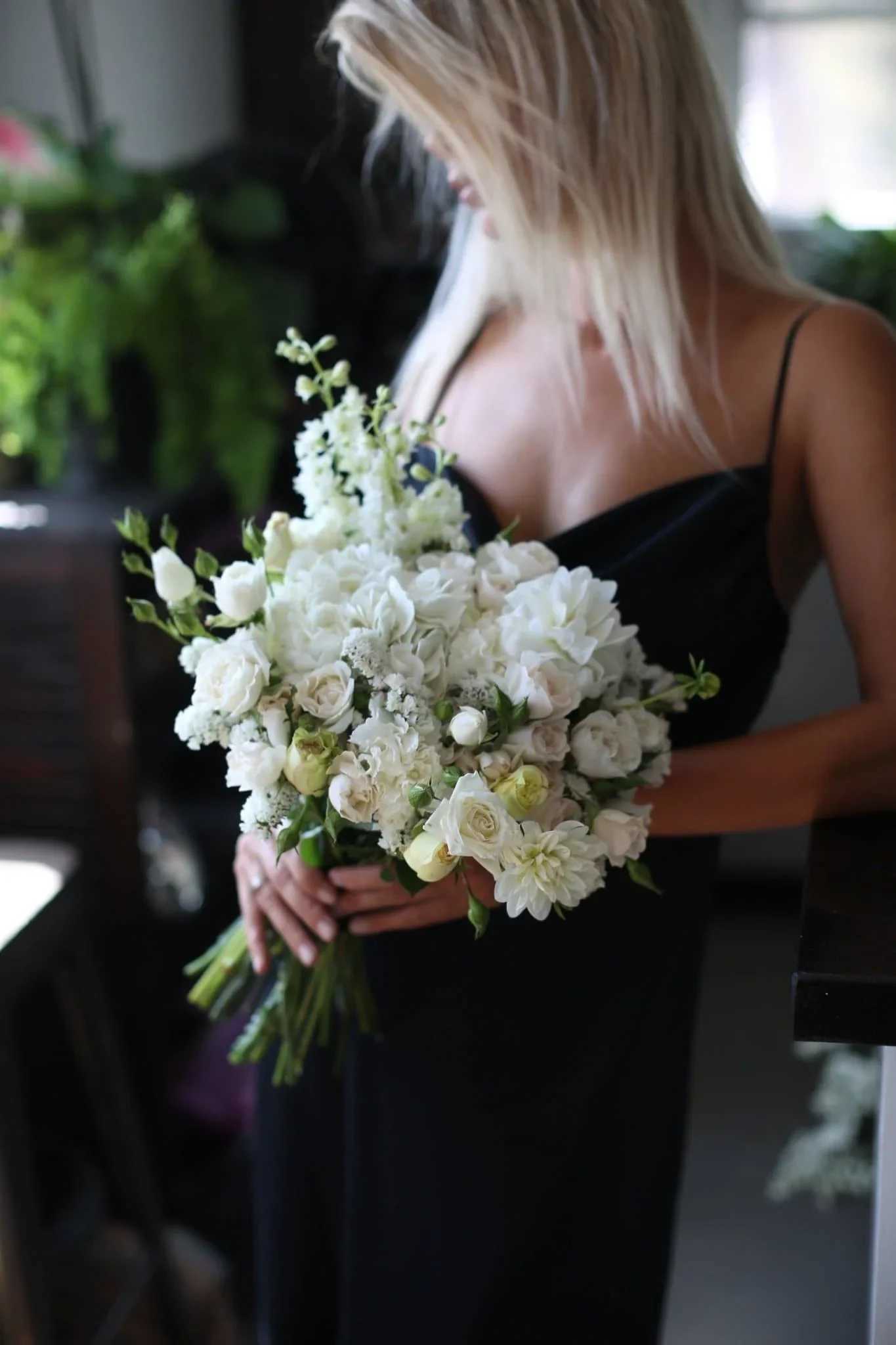 Adele - Adele is a beautiful bridal bouquet featuring a mix of fresh white roses, delphinium, and chrysant