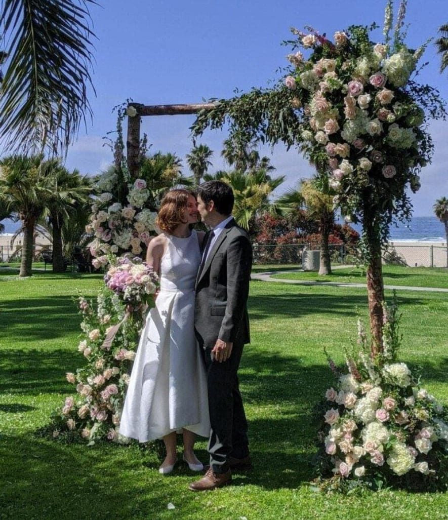Flower Clouds Wedding Arch - We create a memorable entrance for your wedding day with our beautiful and affordable wedding arches. We offer different styles, colors, and sizes to fit your style and budget.  Simply let us know your requirements, and we will gladly bring any floral vision to life upon request.