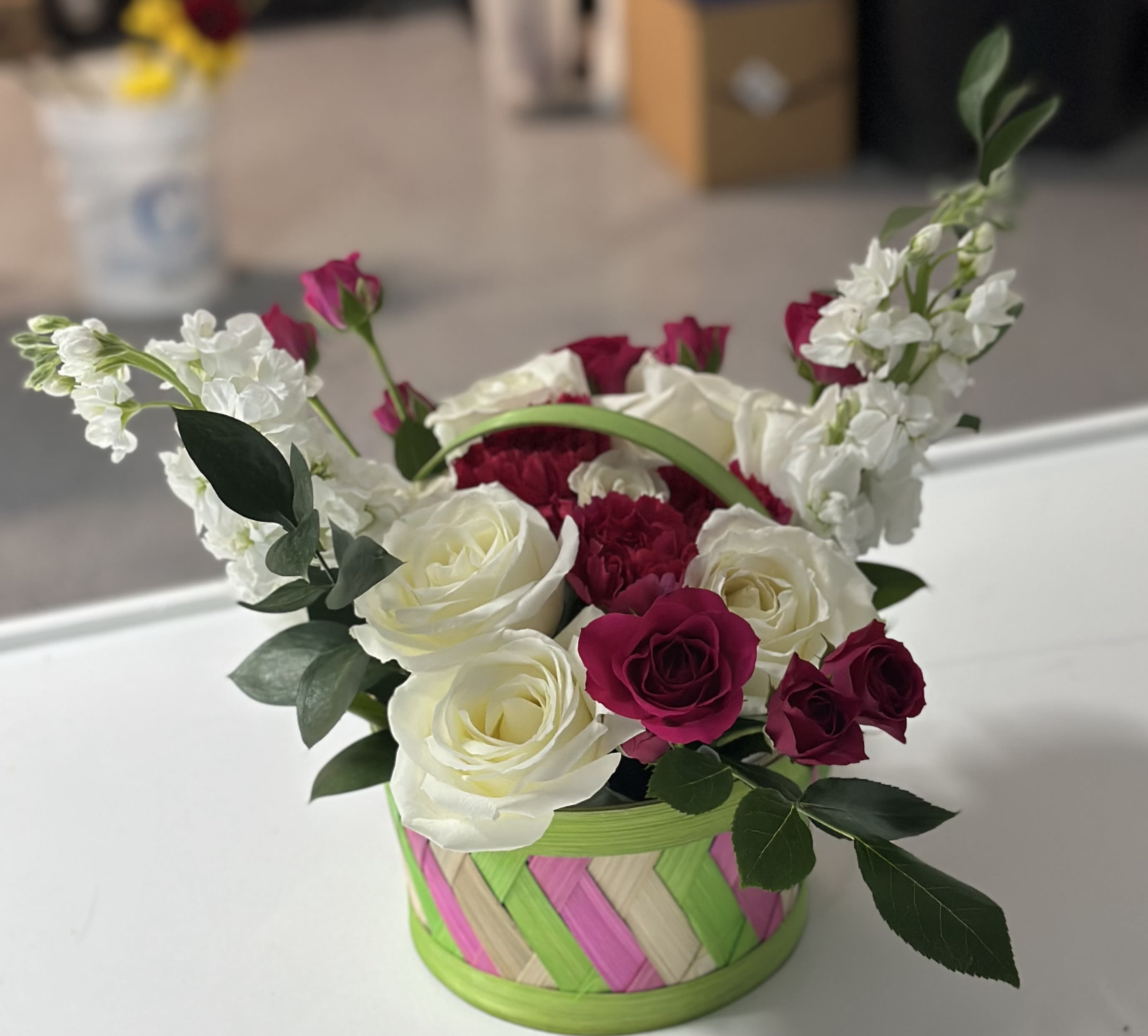 Spring Carousel Spring Carousel - A spring bouquet bursting with vibrant colors and fragrant blooms, featuring an enchanting mix of carnations, spray roses and roses, that capture the essence of the season's renewal and beauty.