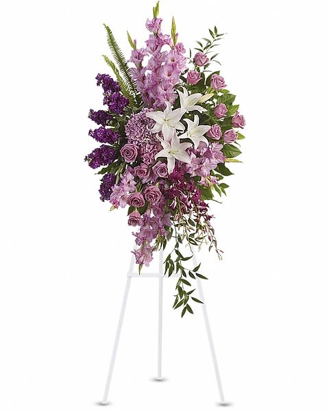 Sacred Garden Standing Spray - A lovely lavender spray of flowers lets you share your compassion, hope and beauty with all. Beautifully simple. Beautifully serene. It's the perfect way to send your sincere sympathy. Lavender, purple and white flowers like hydrangea, orchids, roses, oriental lilies and more create a beautiful spray. A wonderful tribute