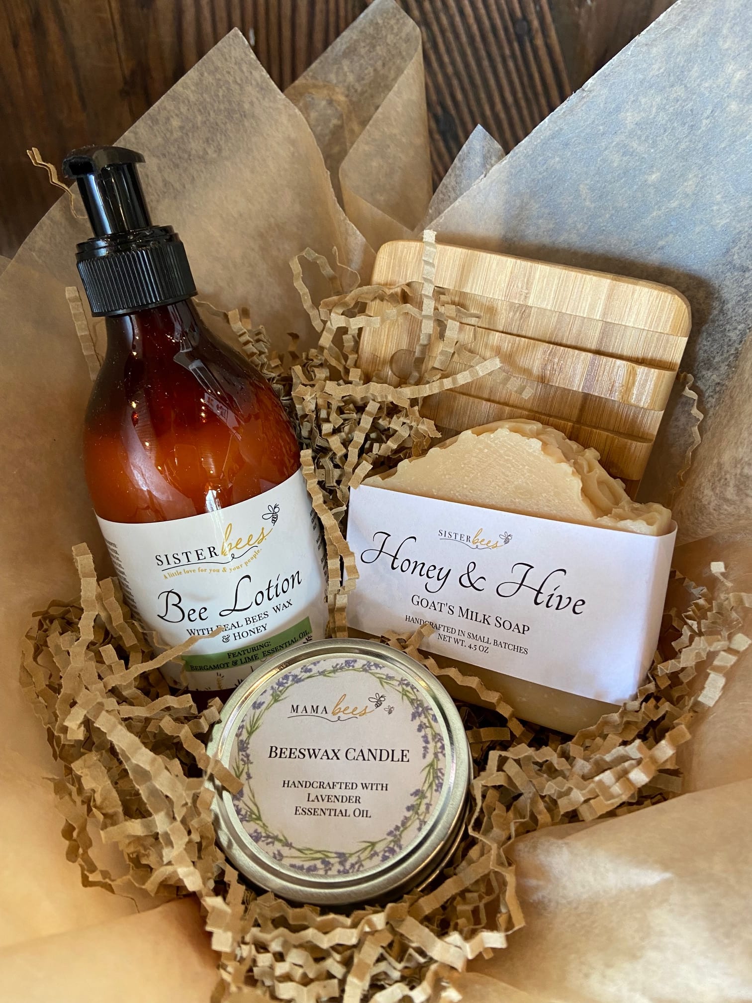 Sister Bees Bath Gift Basket Sister Bees Bath Gift Basket - Luxurious and Fun Bath Products Delivered in a "Bee"autiful Display. Includes Bee Lotion with Real Bees Wax and Honey, Bee Wax Candle in Decorative Tin, Bar of Honey and Hive Goats Milk Lotion, and a Bamboo Self Draining Soap Dish.