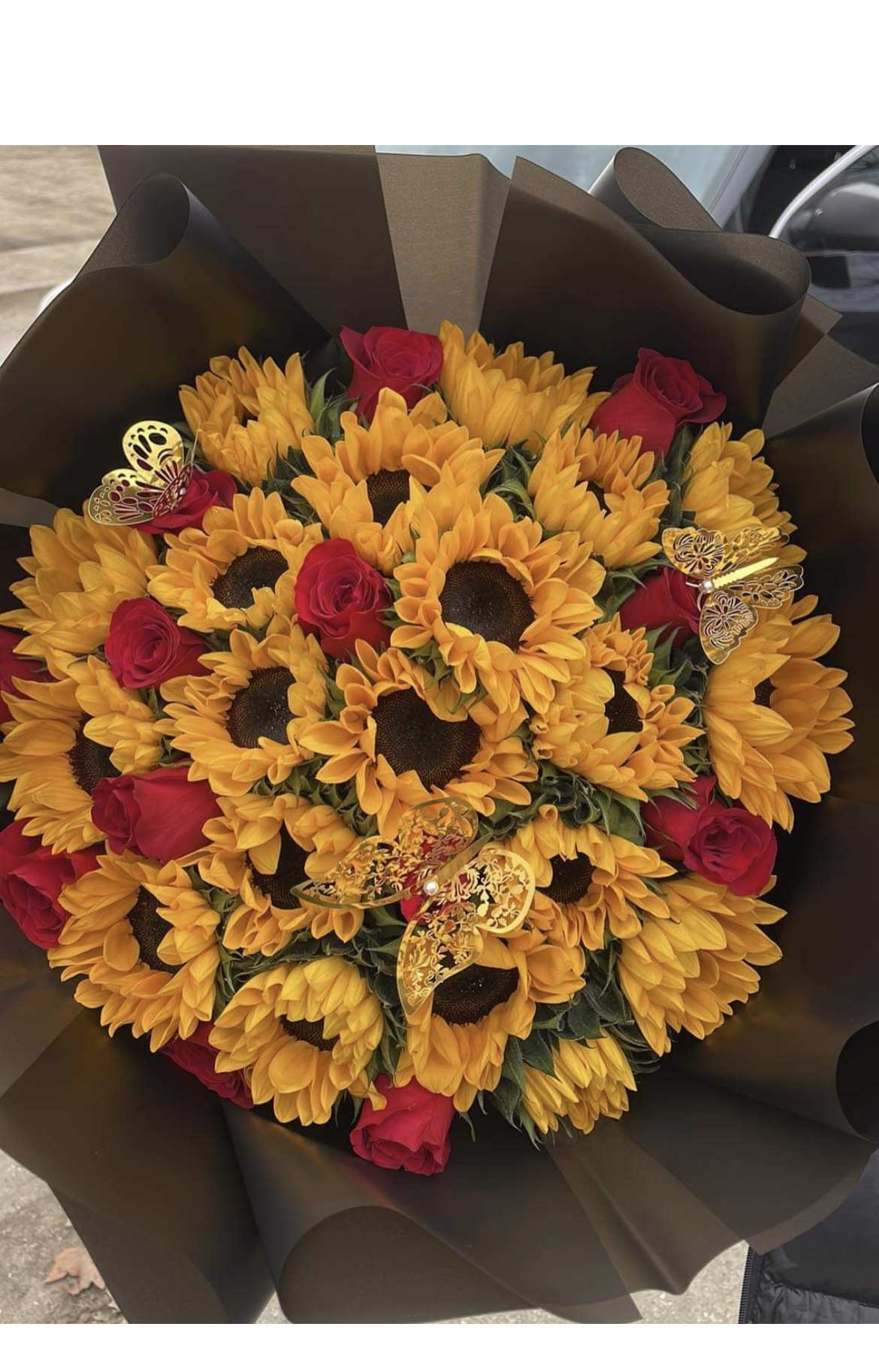 Sunflower and Rose Bouquet Sunflower and Rose Bouquet - Fresh Long Stem Roses and Sunflowers that promise to surprise your loved one.
